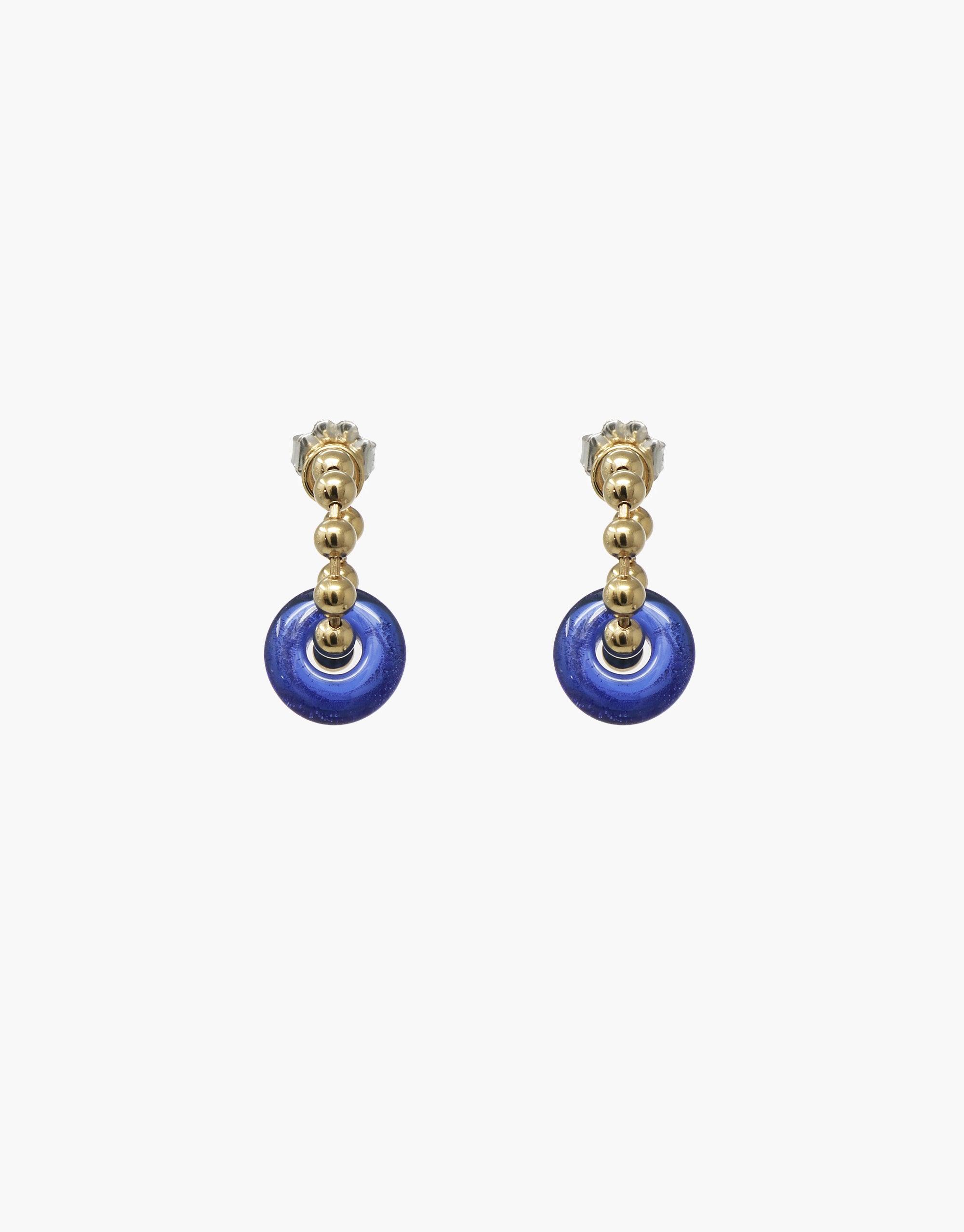 Elegant Donut Ball Hoop Earrings featuring vibrant blue eco-friendly glass discs suspended from gold-toned metal beads, showcasing CLED's commitment to sustainable jewelry design. These handcrafted earrings offer a unique blend of style and environmental consciousness. Donut Ball Hoop Earrings by CLED.