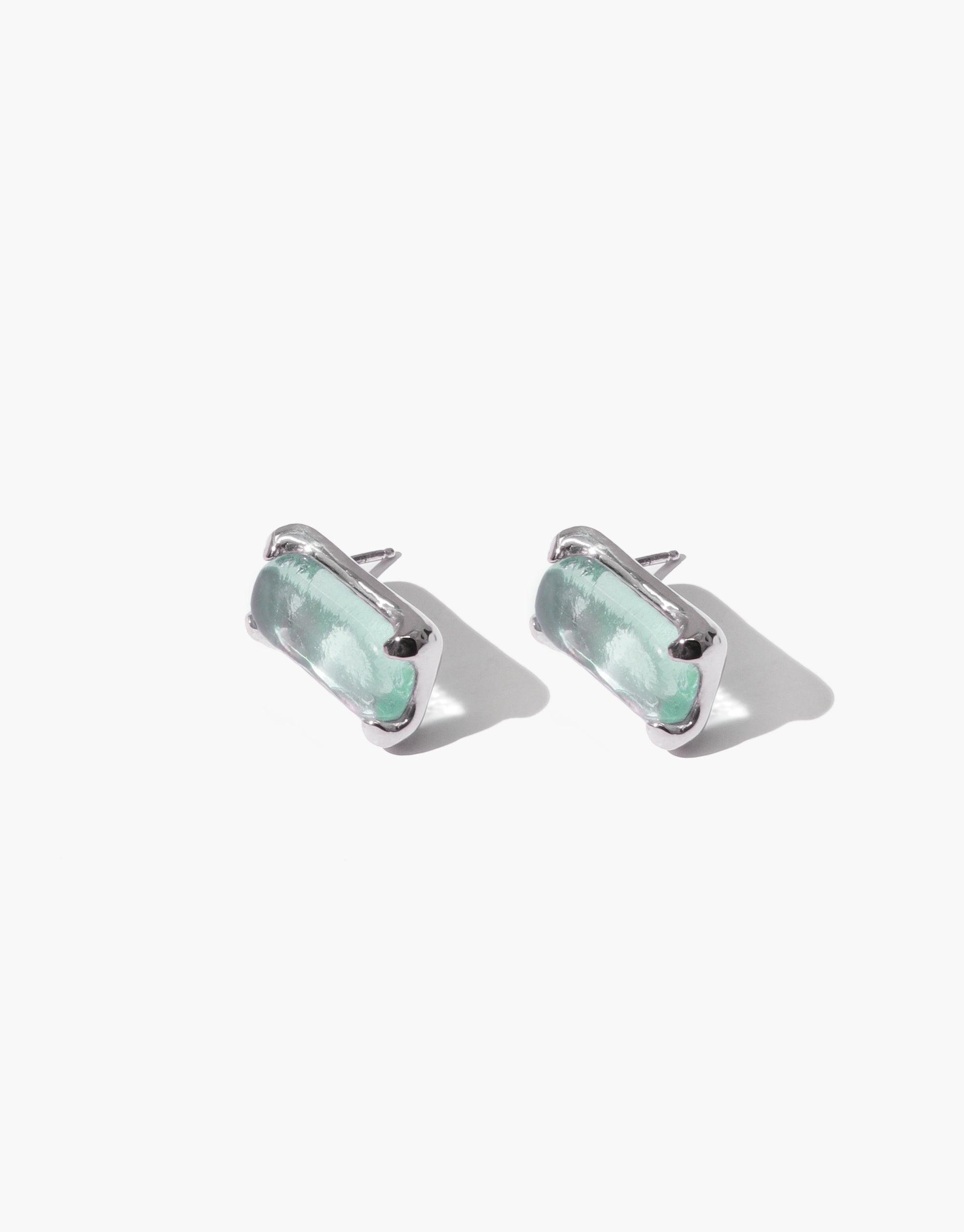 Prism Earrings featuring rectangular eco-friendly glass gems in soft seafoam green, set in sleek silver metal. Elegant and sustainable jewelry design with a subtle prismatic effect. Handcrafted eco-luxe accessories by CLED.