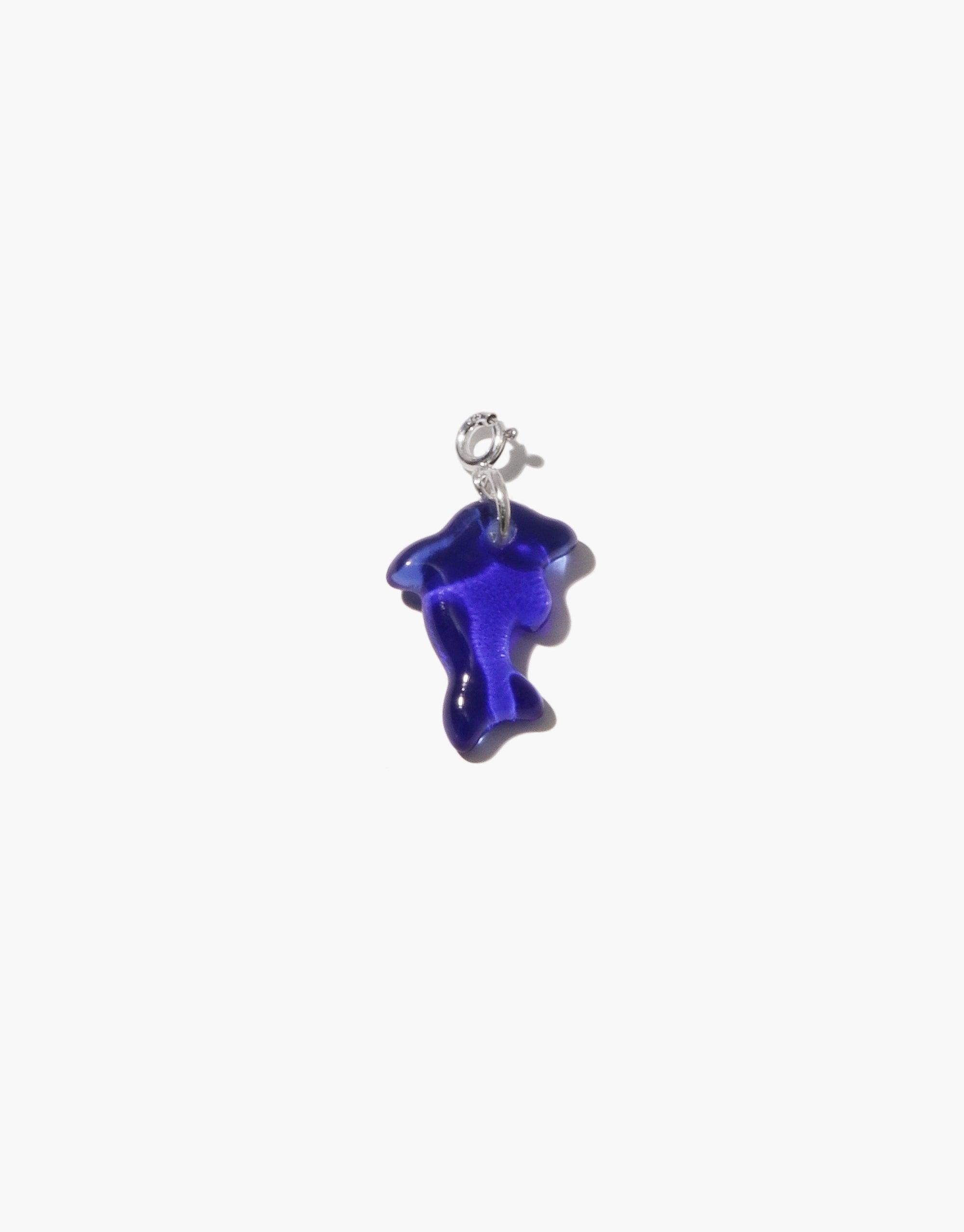 Handcrafted blue glass dolphin charm pendant with silver clasp, perfect for necklaces or bracelets. Upcycled eco-friendly jewelry piece from repurposed glass bottles. Dolphin | Icon Charm by CLED