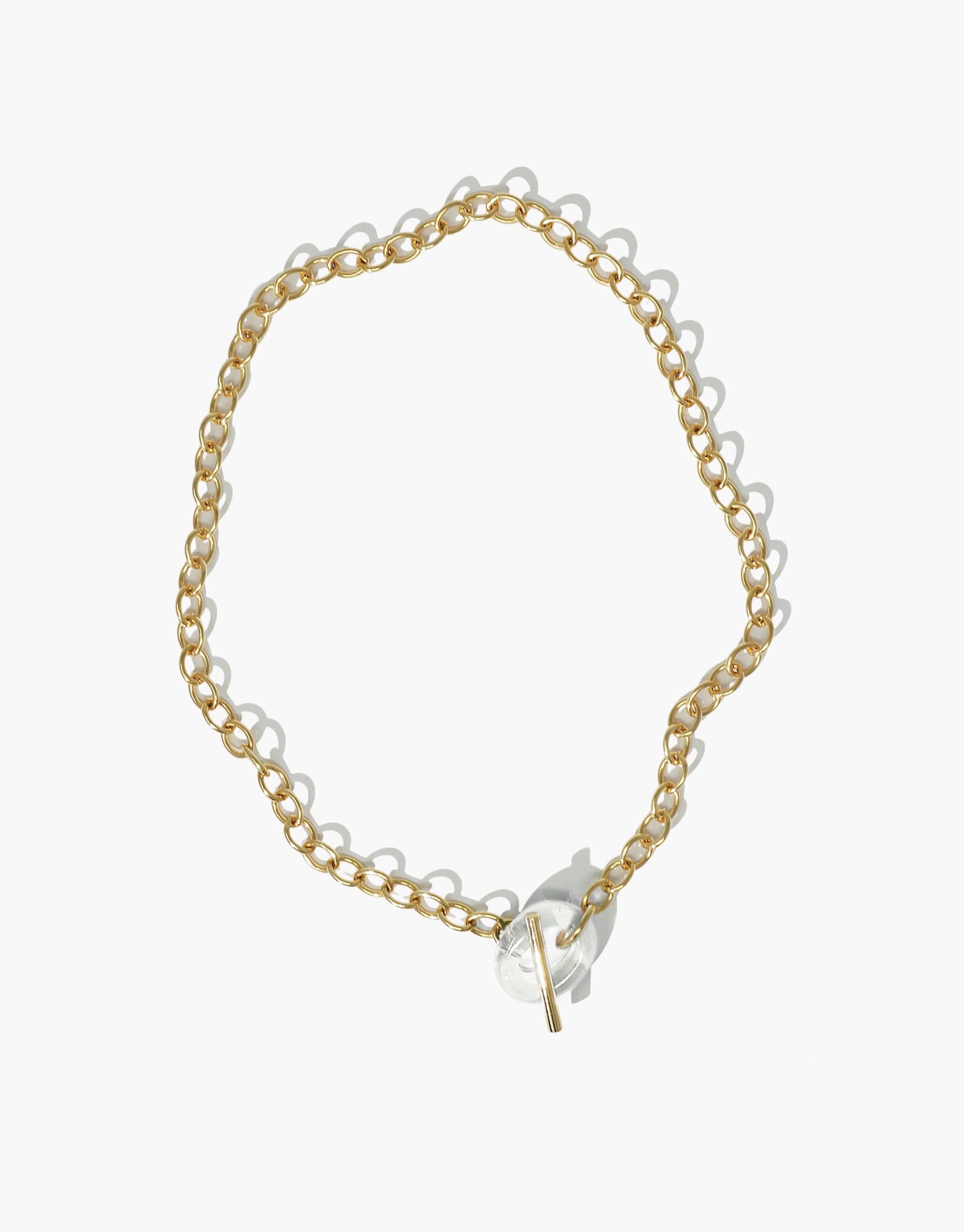 Elegant ITL Toggle Choker Necklace with interlocking gold-toned links and white eco gem loop closure, showcasing sustainable luxury and versatile design. Handcrafted necklace perfect for eco-conscious fashion lovers seeking timeless style. CLED, ITL Toggle Choker Necklace.