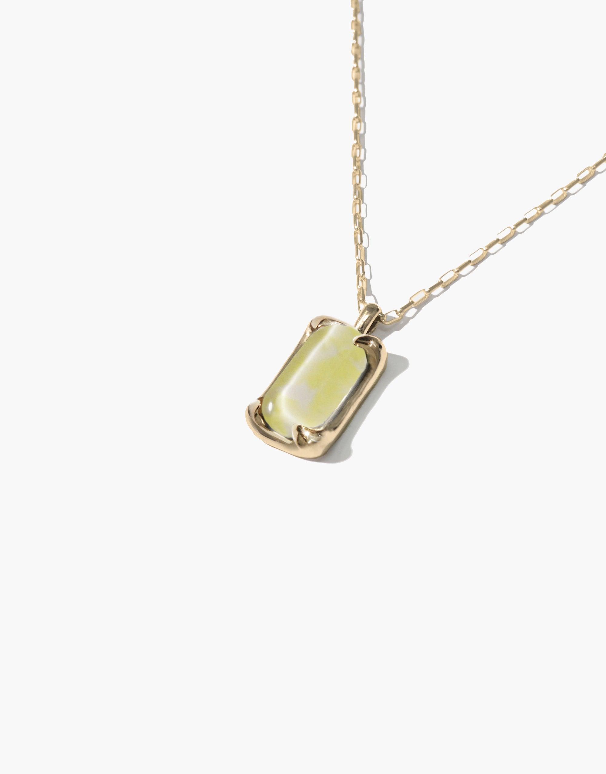 Elegant Prism Necklace featuring a unique marble-effect eco gem pendant in pale yellow, crafted from recycled glass, suspended on a delicate gold chain. Sustainable luxury jewelry showcasing handmade artistry and environmental consciousness. Prism Necklace | Marble by CLED