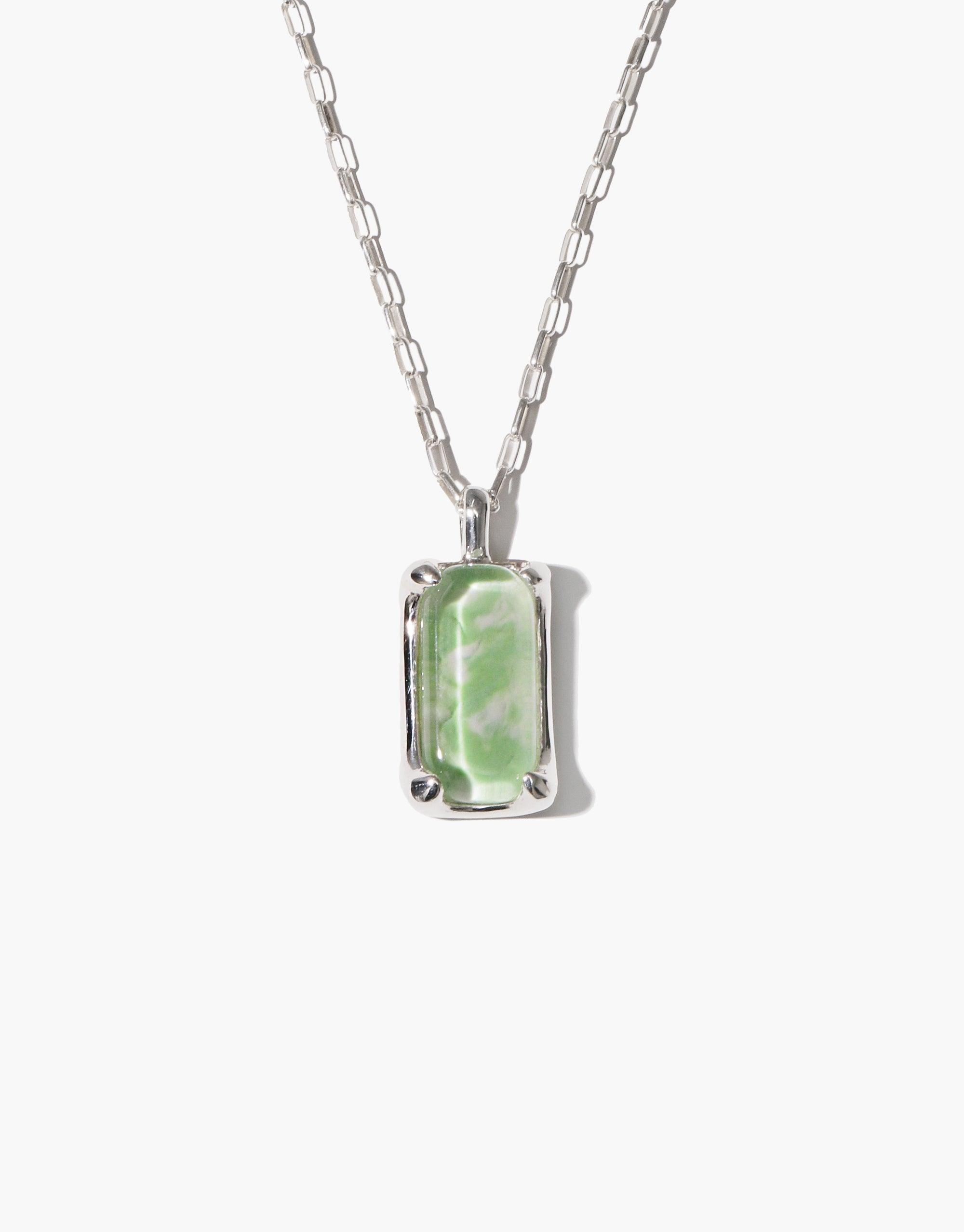 Prism Necklace | Marble featuring a silver chain with rectangular pendant showcasing green and white marbled eco-friendly glass, handcrafted using recycled bottles and traditional enameling techniques. Sustainable jewelry piece by CLED.