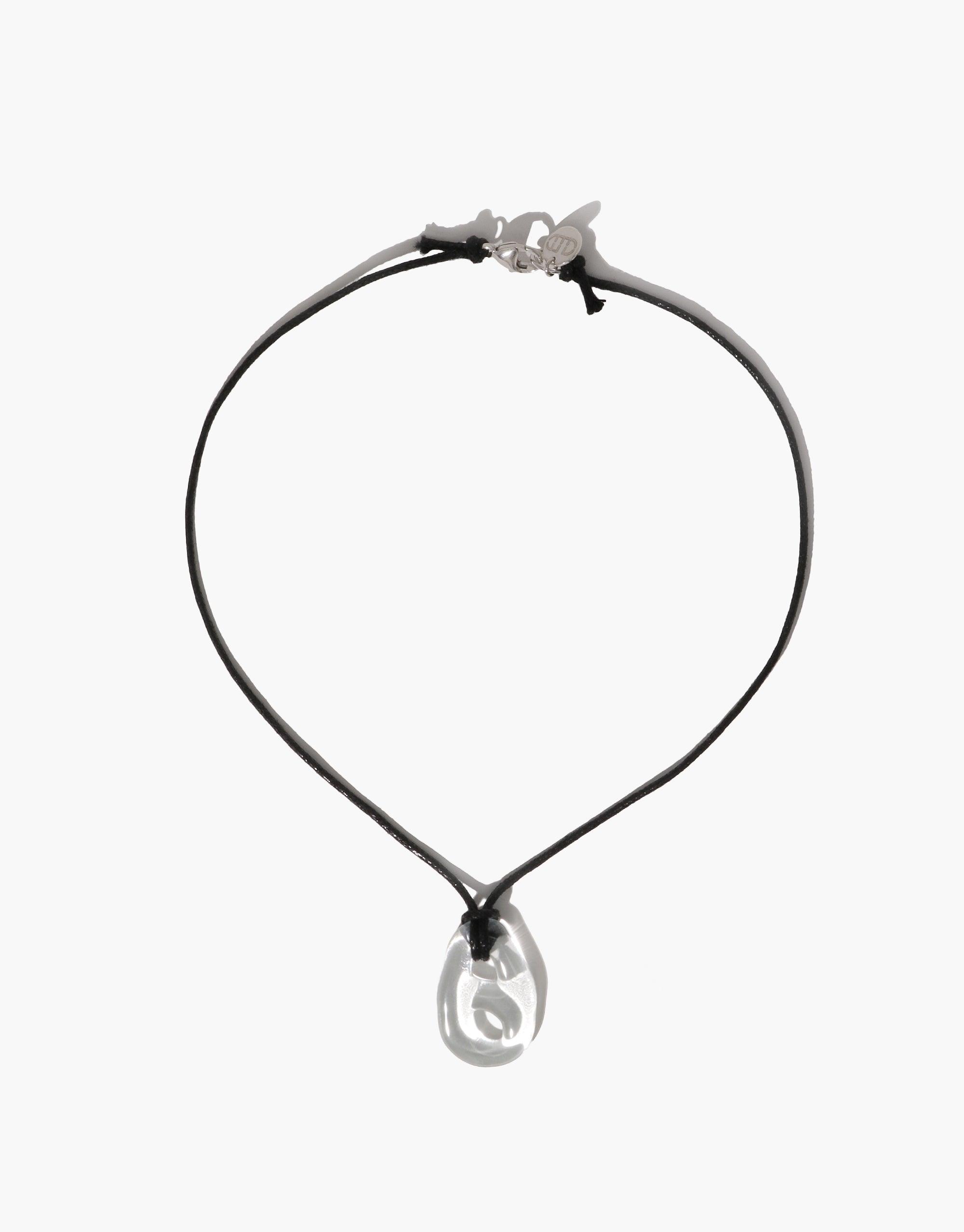 Sculptural Small Charm Necklace with delicate glass pendant on black cotton cord. Minimalist design featuring upcycled eco-friendly materials. Handcrafted jewelry showcasing sustainable fashion. Sculptural Small Charm Necklace | B by CLED.