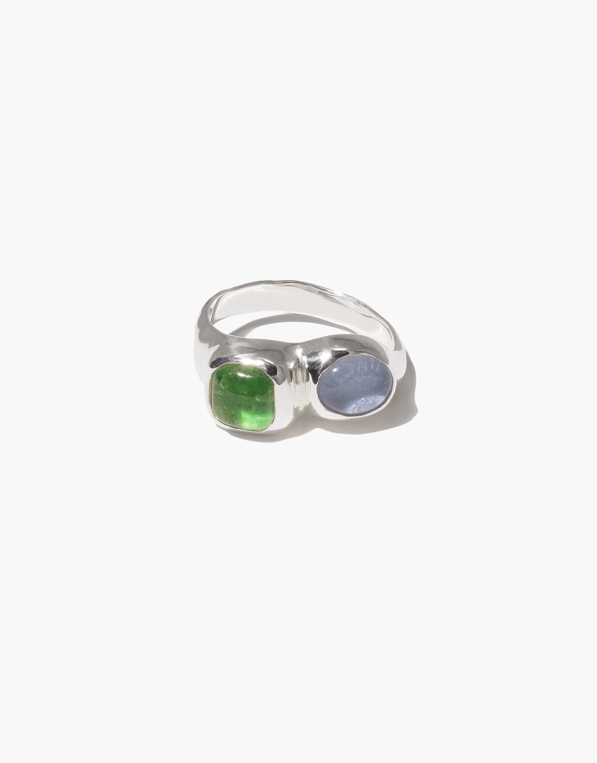 Duo Sculpture Ring featuring two square eco gems, green and blue, set in a sleek silver band. Handcrafted design showcasing upcycled glass. Sustainable and stylish jewelry piece by CLED.
