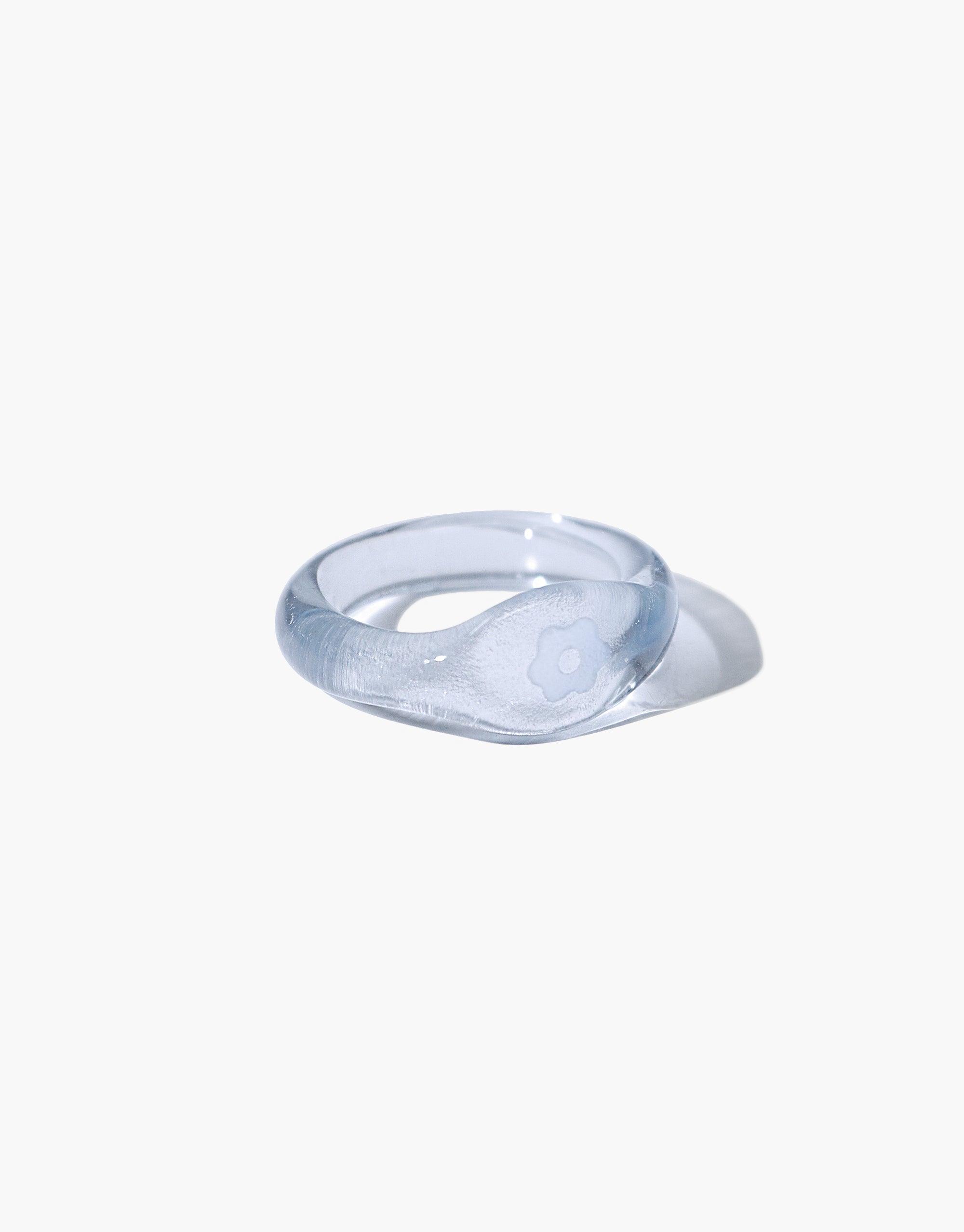 Avens Signet Ring: Clear glass eco gem ring with engraved flower symbol. Handmade, sustainable jewelry piece from the Messenger Collection. Elegant and minimalist design. CLED
