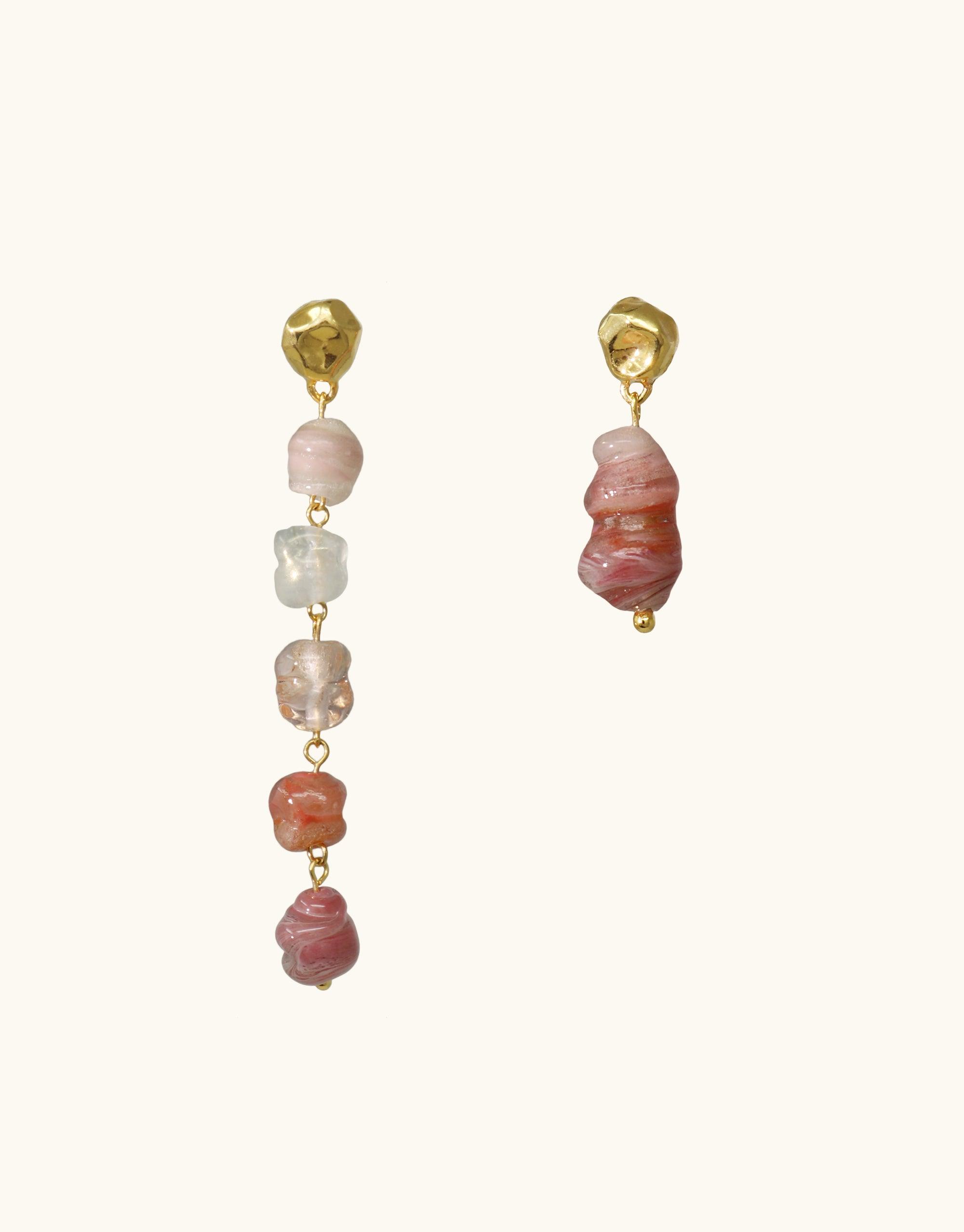 Asymmetrical earrings with gold vermeil studs and pink gradient upcycled eco gems, reflecting canyon-inspired curves and layers. Handmade Shades of Nature Bloom Earrings showcase nature's beauty in blush tones. CLED