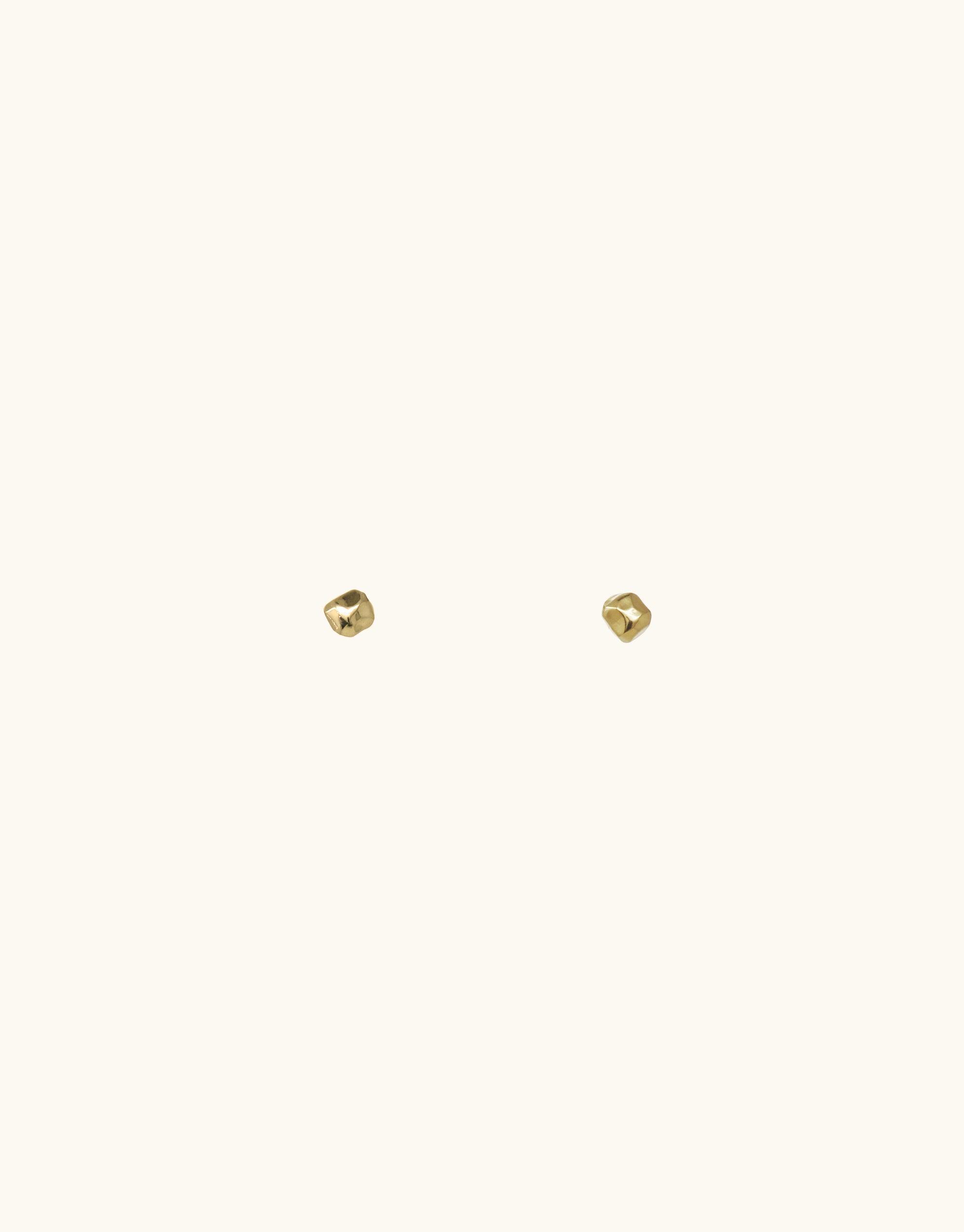 Minimalist gold Pebble Stud Earrings from the Terrain Collection, inspired by canyon formations. Small, abstract molten forms in gold vermeil, perfect for everyday wear. Handmade in Los Angeles. Versatile and elegant accessory by CLED.