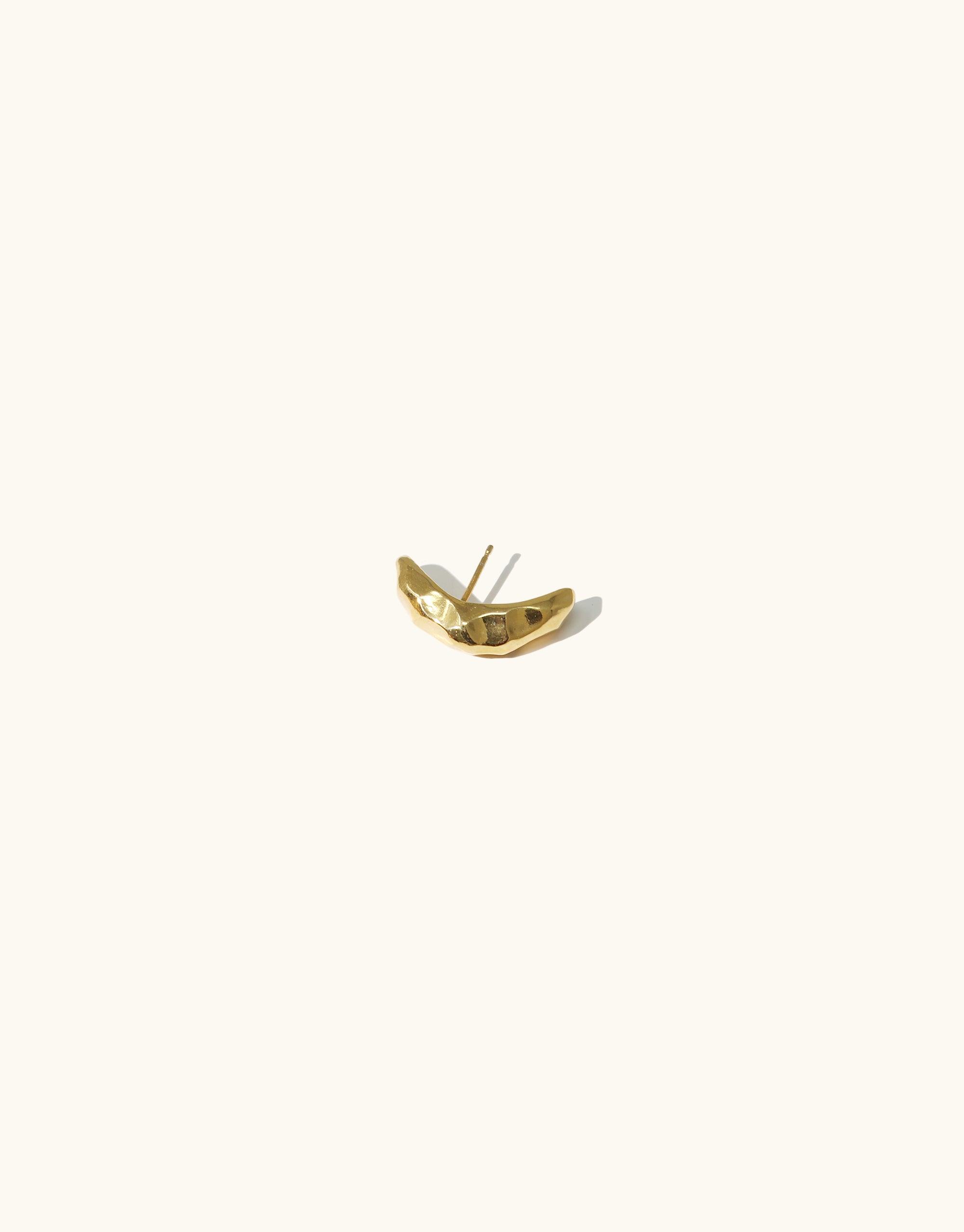 Elegant gold vermeil Rock Stud Earrings from the Terrain Collection, featuring a curved textured design inspired by canyon formations. Handmade in Los Angeles, these versatile studs measure 0.8 inches in length, perfect for day-to-night wear. CLED Rock Stud Earrings.