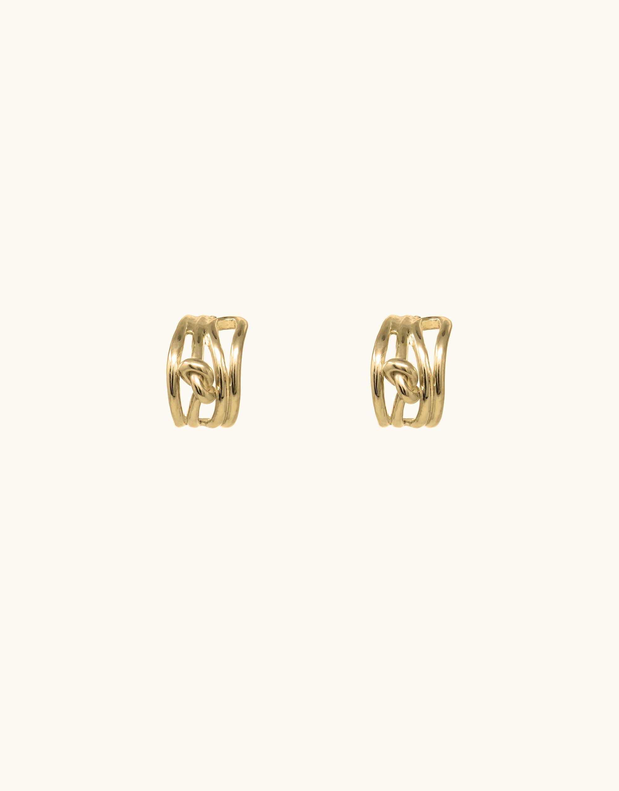 Elegant gold vermeil Rope Hoop Earrings featuring intertwined strands, inspired by canyon terrain. Minimal design suitable for any outfit. Part of the Terrain Collection, handmade in Los Angeles. Available as a pair. Rope Hoop Earrings by CLED.