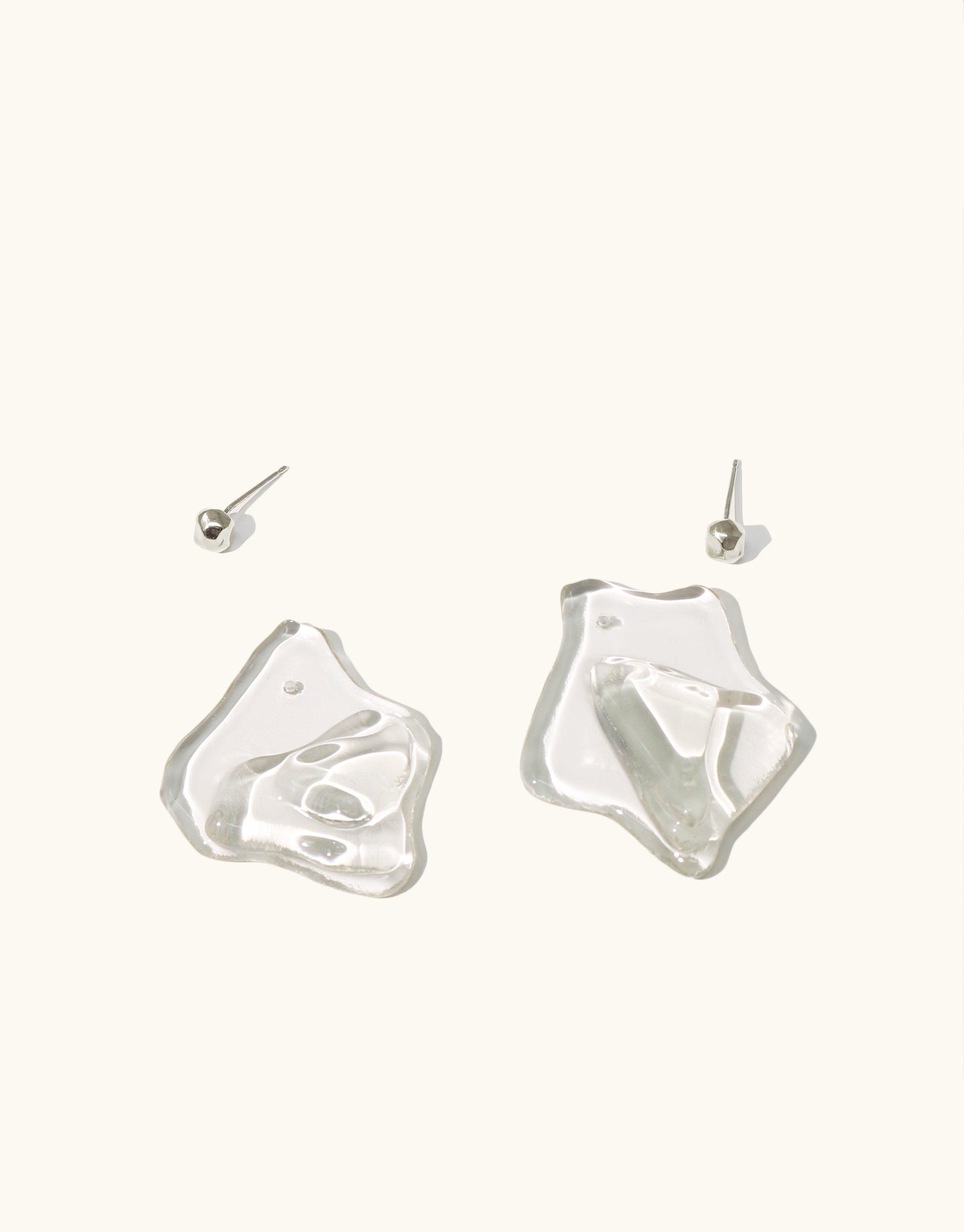 Handcrafted Plateau Earrings featuring abstract molten glass forms inspired by canyon terrain, with detachable studs. Eco-friendly design made from repurposed glass bottles. Elegant and sustainable jewelry piece by CLED.