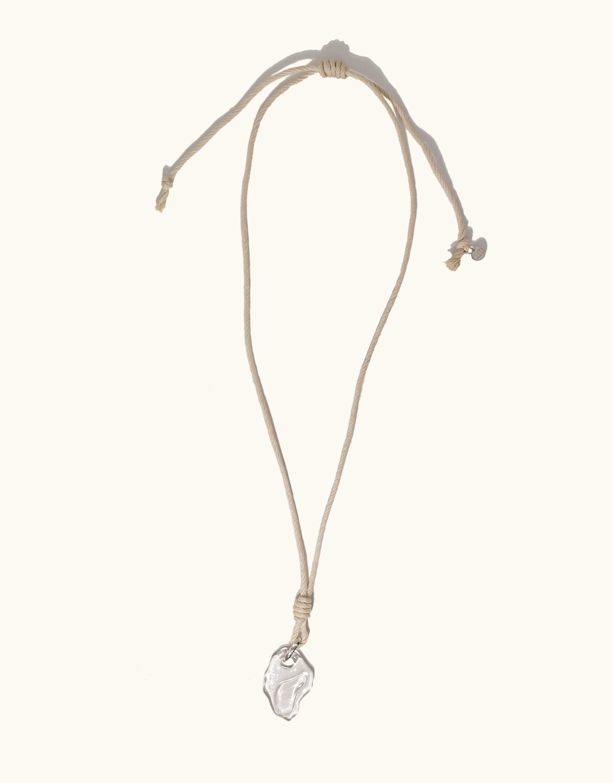 Rope Knotted Necklace with adjustable hemp cord and hand-formed glass pendant inspired by canyon terrain. Eco-friendly, sustainable jewelry featuring repurposed glass and plant-based wax coating. Handmade in Los Angeles. Terrain Collection by CLED.