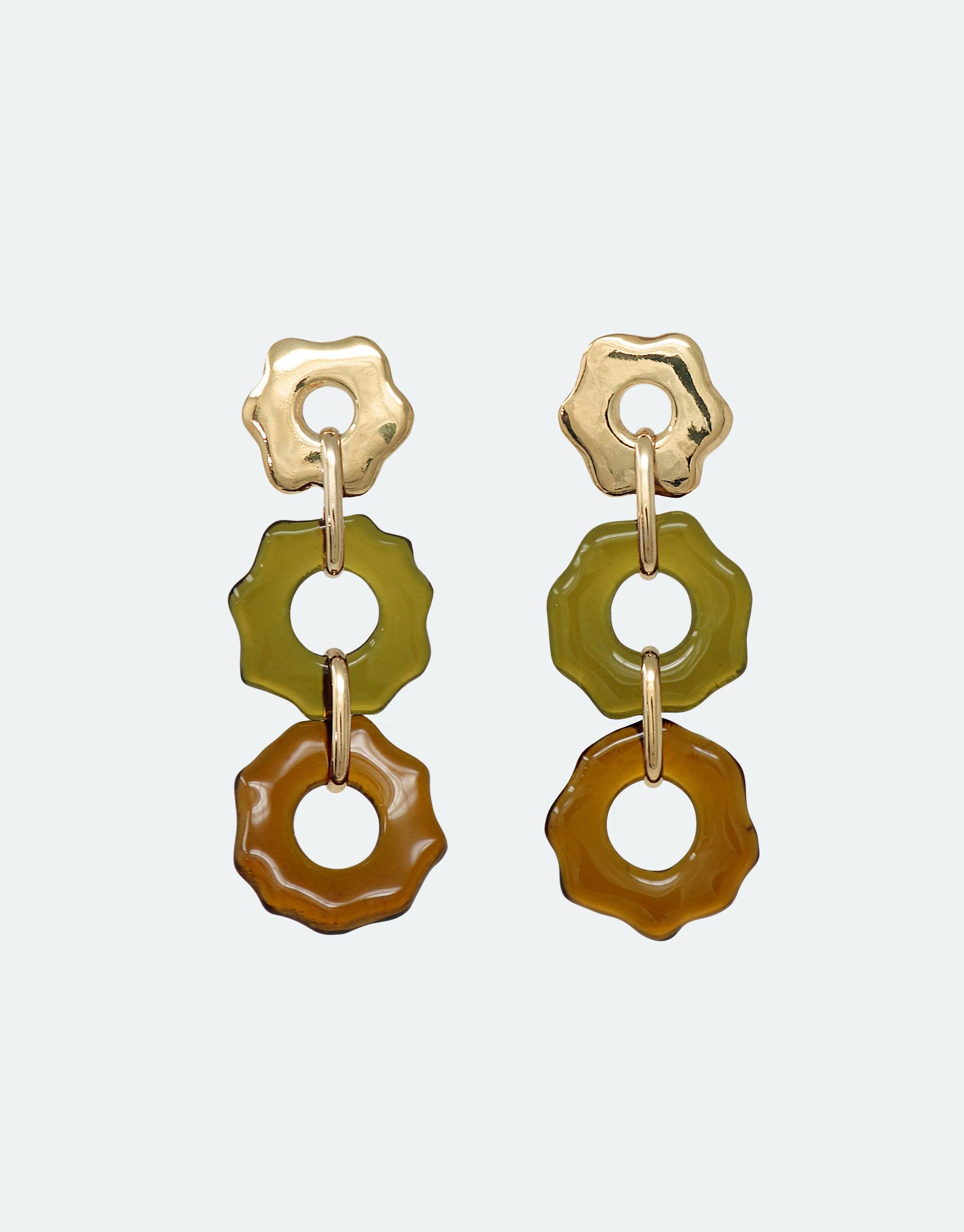 Avens Earrings Trio featuring three linked floral-shaped charms in gold, olive green, and amber. Handmade eco-friendly earrings with organic forms inspired by climate change awareness. Stylish and sustainable jewelry by CLED.