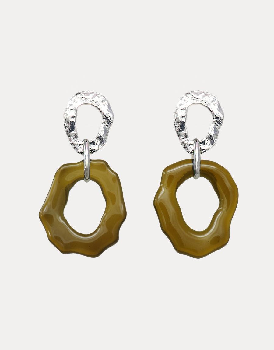 High Tide Earrings featuring textured silver hoops with organic-shaped olive green glass pendants. Eco-friendly statement jewelry with a wave-like design, showcasing repurposed materials. Elegant and sustainable earrings for ocean-inspired style. CLED High Tide Earrings.