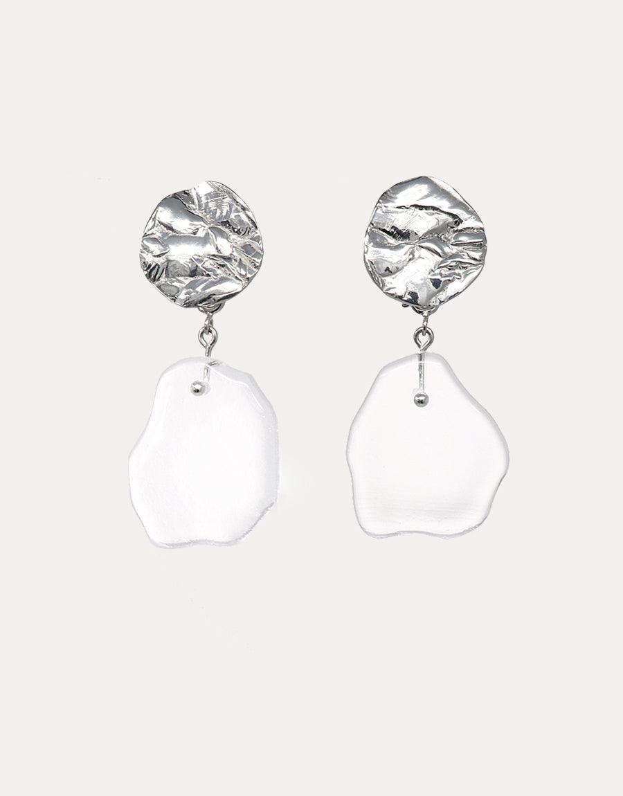 Coastline Earrings | Small Drop featuring textured silver studs with irregular white glass pendants. Handcrafted eco-friendly jewelry inspired by coastal shapes. Elegant and sustainable design by CLED
