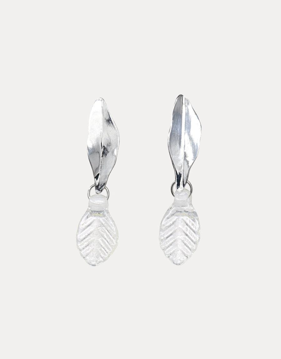 Sterling silver Leaf Earrings featuring delicate, hand-formed leaf shapes with transparent glass drops. Eco-friendly design using repurposed glass bottles. Elegant botanical-inspired jewelry piece, perfect for nature lovers. Handcrafted in Los Angeles. CLED Leaf Earrings.