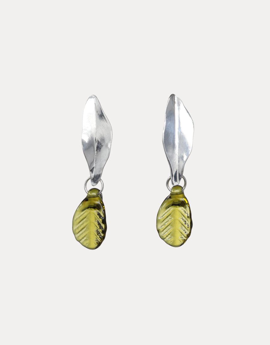 Elegant Leaf Earrings featuring sterling silver leaf-shaped tops with dangling olive-green eco-friendly glass pendants. Handcrafted design showcasing nature-inspired aesthetics and sustainable materials. Perfect for eco-conscious fashion lovers. Leaf Earrings by CLED.