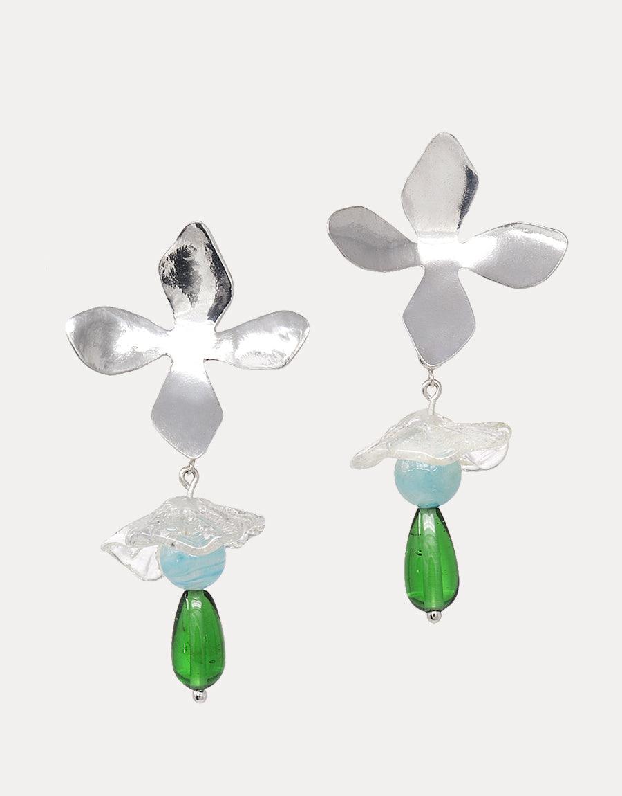 Flower shaped silver earrings embellished with green glass beads, offering a unique and eye-catching accessory.