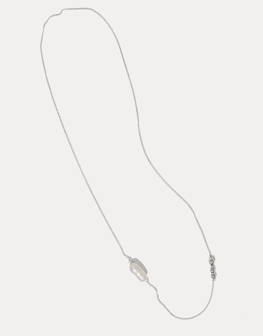 Elegant Shoreline Long Necklace featuring delicate sterling silver chain with sustainable pearl Eco Gem and water drop pendant, perfect for layering or wearing alone. Handcrafted in Los Angeles using repurposed glass. CLED