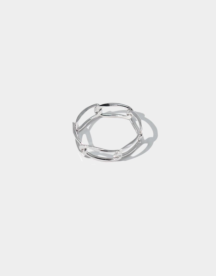 Sterling silver Collapsible Chain Ring D with interlocking oval links on white background. Handcrafted, versatile design for mixing and matching. Available in various sizes. Collapsible Chain Ring | D by CLED