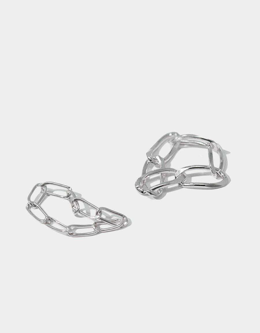 Sterling silver Collapsible Chain Ring C with flexible, resizable design. Two rings shown, one collapsed and one expanded, demonstrating versatility. Handcrafted in Los Angeles, perfect for mixing and matching. Collapsible Chain Ring | C by CLED