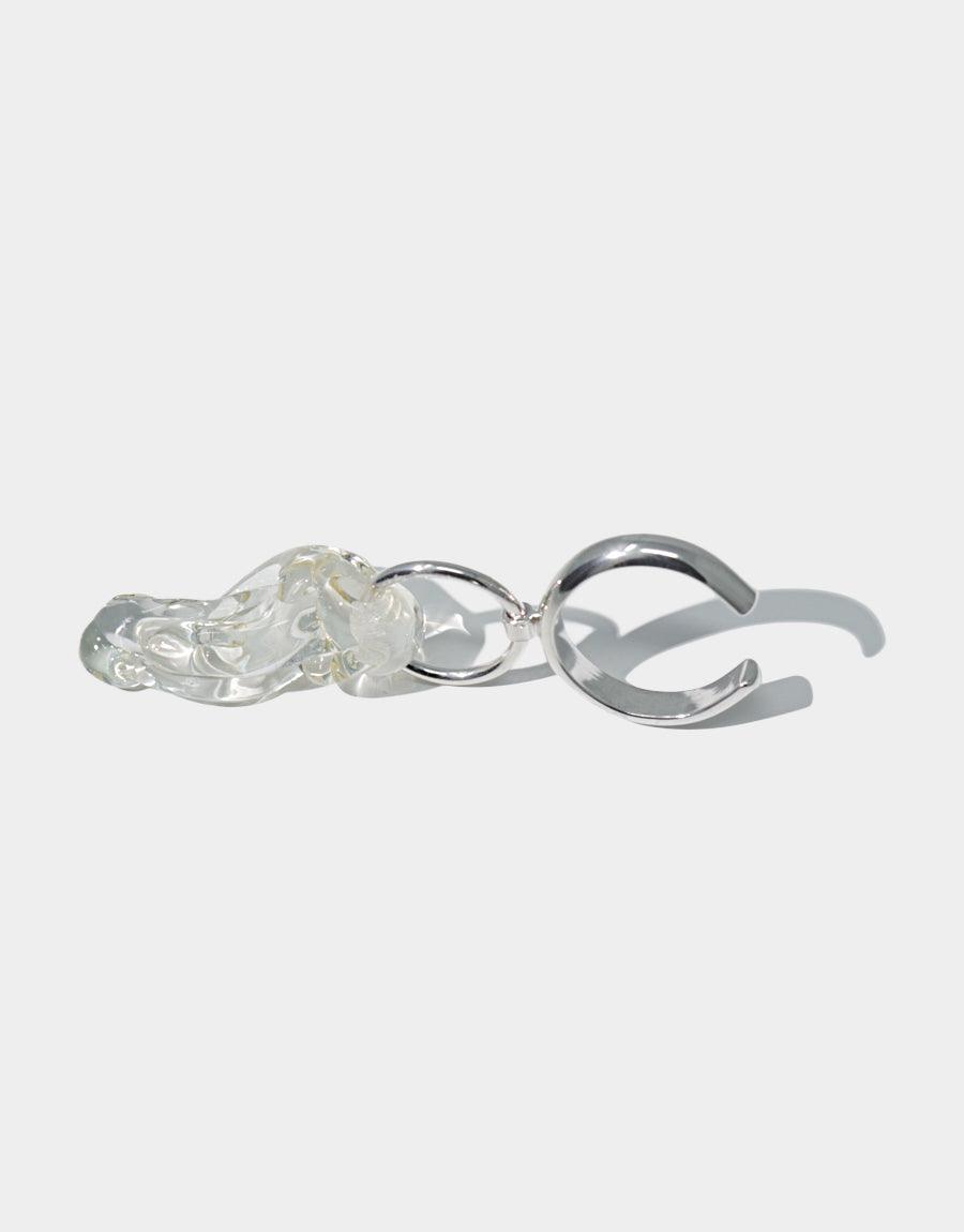 Sterling silver Amorphous Ring with unique hand-formed glass gem, showcasing organic drop shape and adjustable design. Sustainable jewelry piece repurposed from discarded glass. Handcrafted CLED Amorphous Ring.