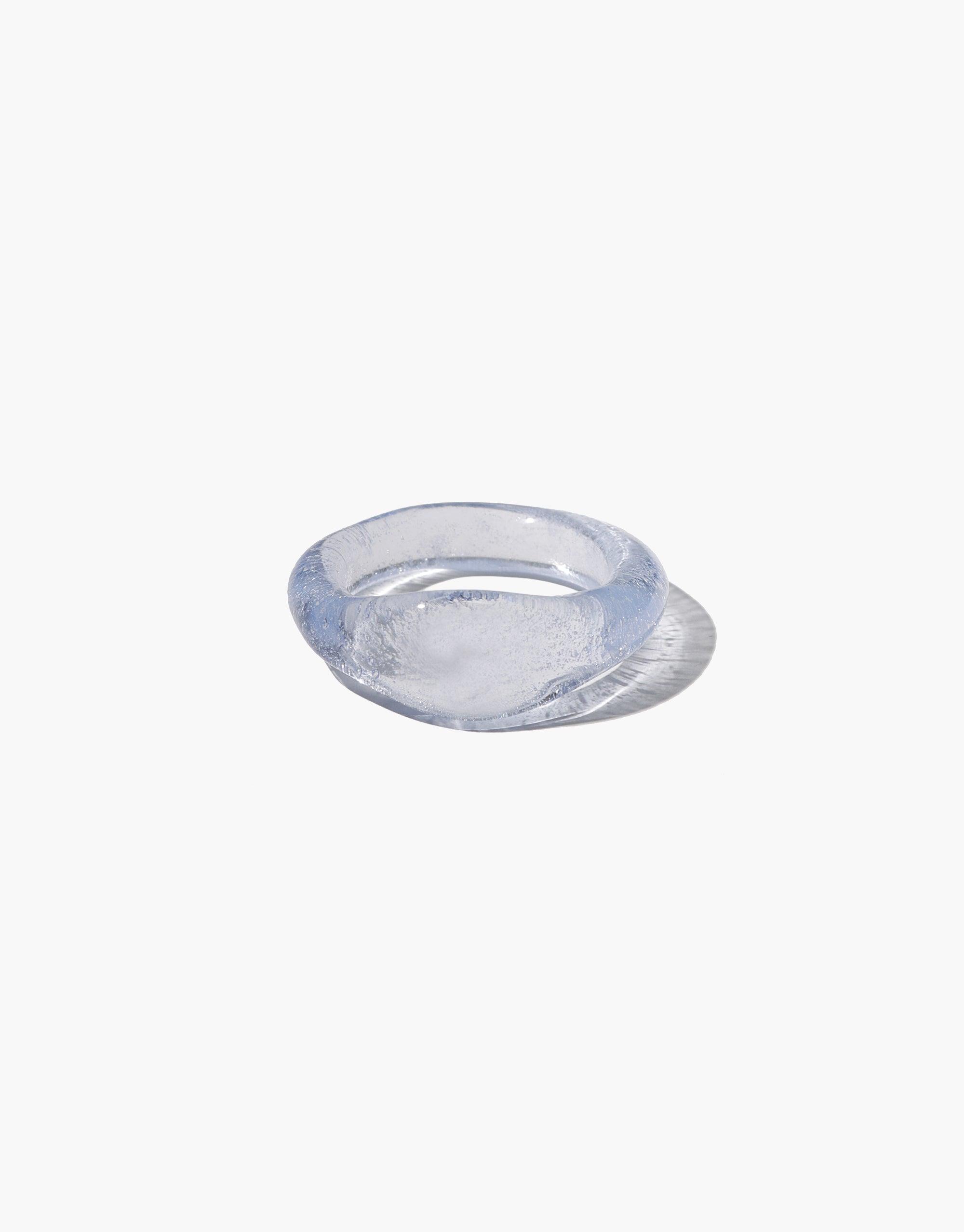 Signet Ring Original by CLED: Transparent eco-friendly glass ring with a smooth, modern design. Handcrafted from recycled materials, this versatile and sustainable accessory showcases CLED's commitment to ethical fashion and environmental responsibility.