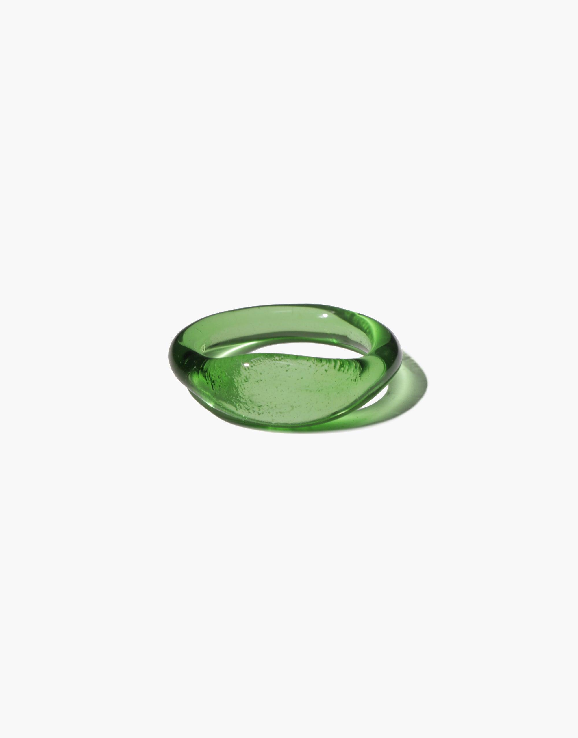 Green eco-friendly signet ring made from repurposed glass, part of the Messenger Collection. Handcrafted, sustainable jewelry piece showcasing CLED's commitment to eco-conscious design. Signet Ring Original by CLED.
