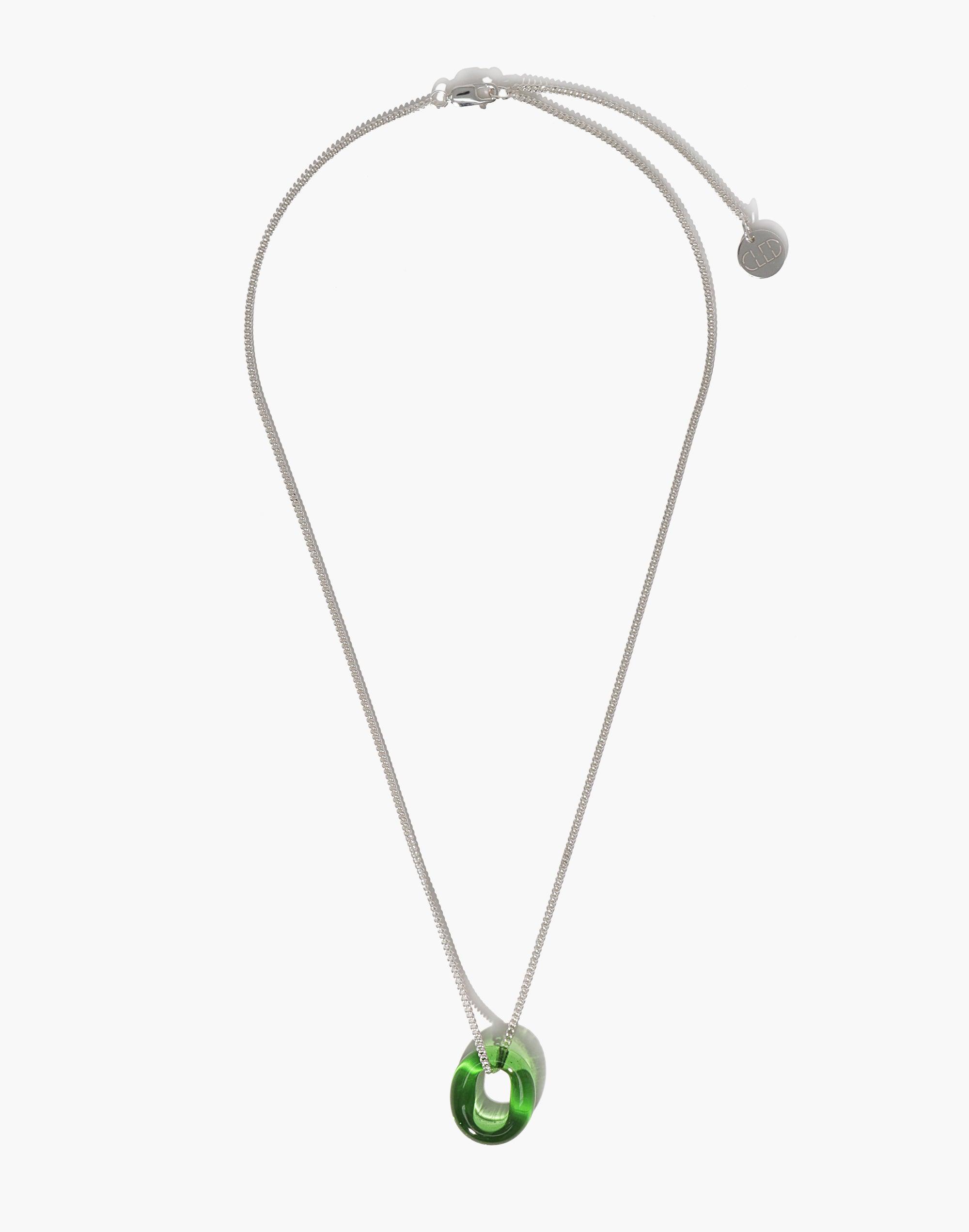 Elegant silver chain necklace with adjustable clasp featuring a vibrant green glass loop pendant, showcasing minimalist design and eco-friendly craftsmanship. In The Loop Necklace from CLED's Minimal Collection, handmade in Los Angeles.