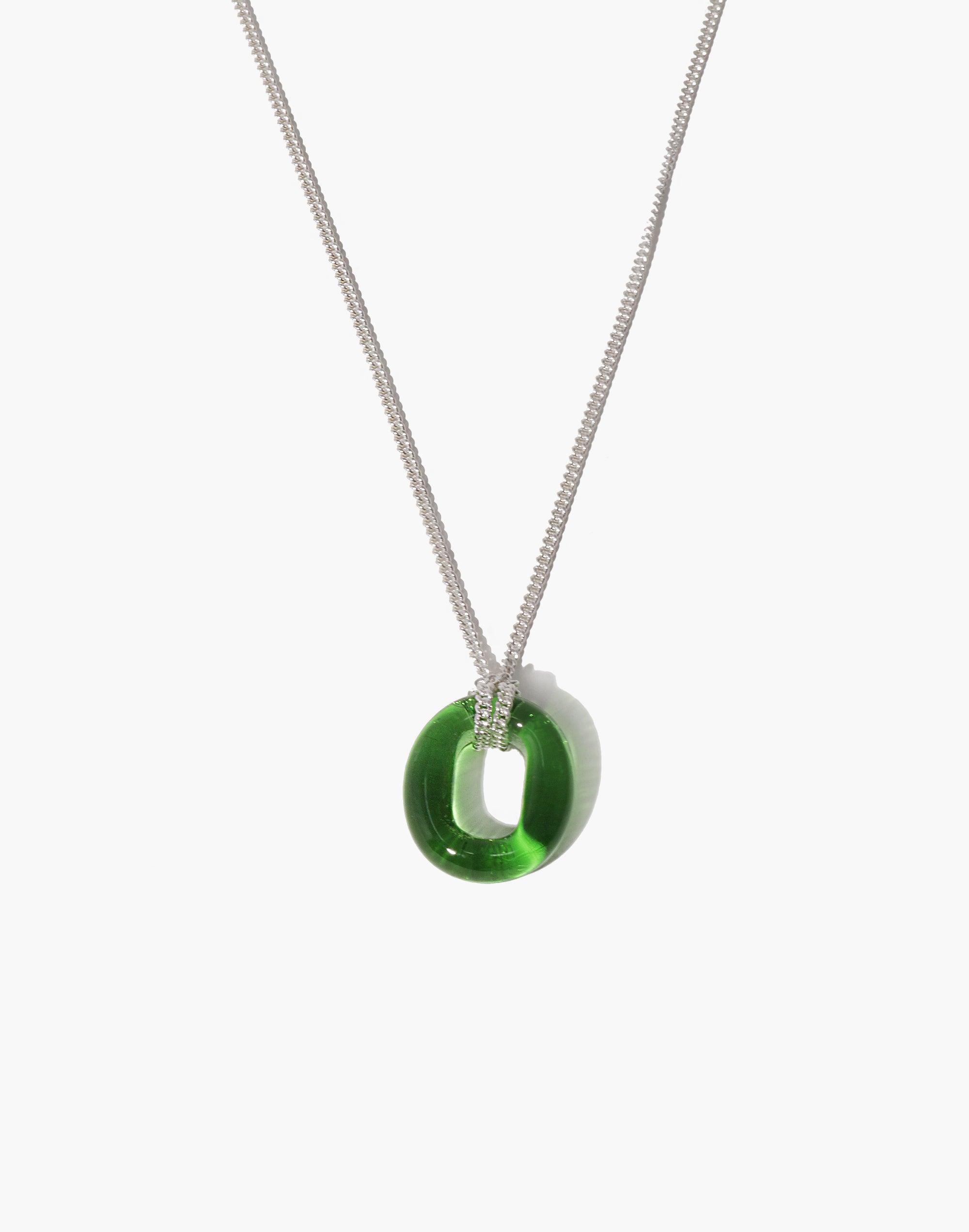 Elegant In The Loop Necklace featuring a vibrant green glass eco gem pendant on a delicate silver chain, showcasing sustainable luxury and minimalist design. Handcrafted from repurposed glass for eco-conscious style. CLED