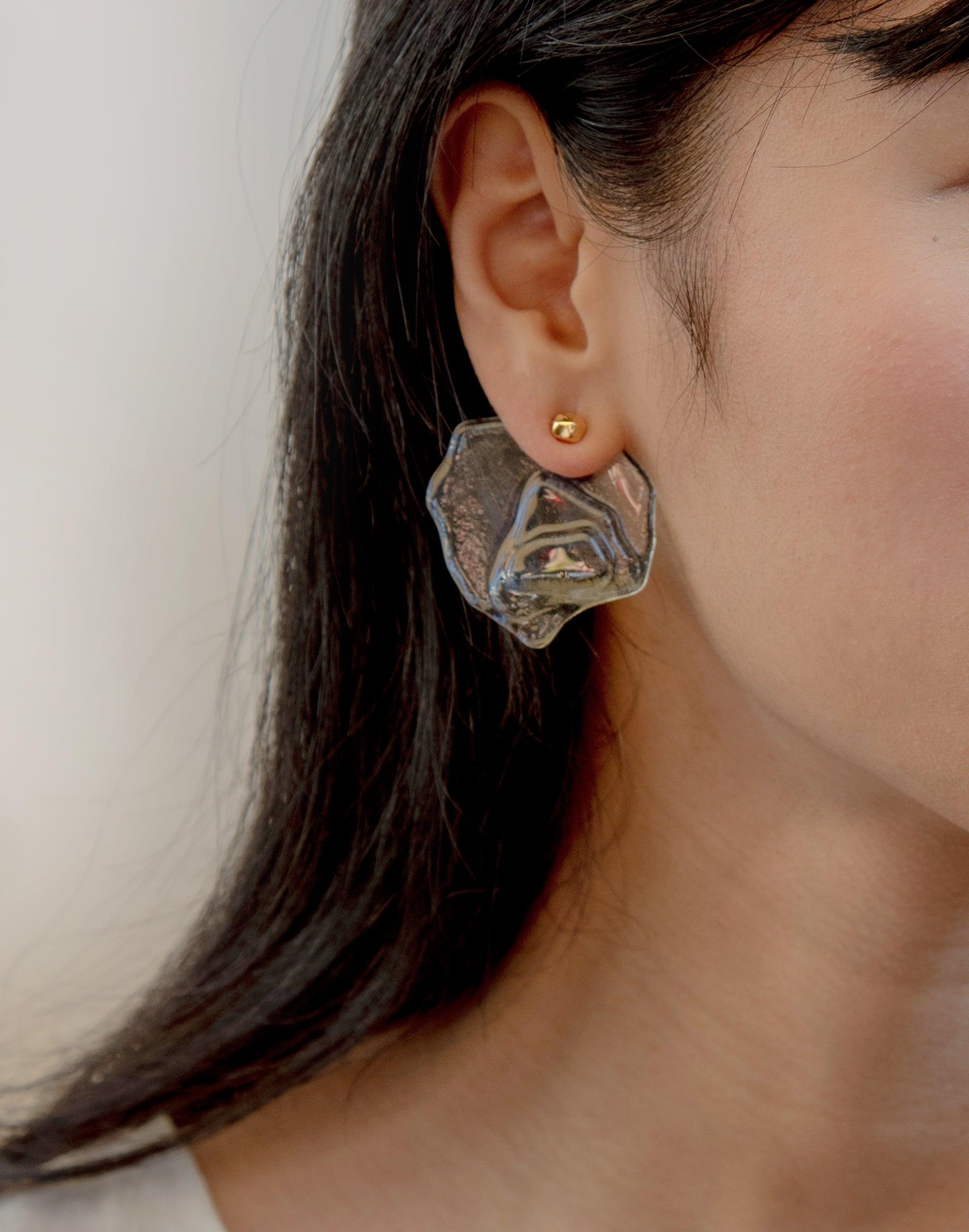 Plateau Earrings featuring layered eco-glass in abstract canyon-inspired form, paired with detachable gold stud. Handcrafted sustainable jewelry showcasing unique terrain-like texture and translucent design. Elegant and eco-conscious accessory from the Terrain Collection by CLED.