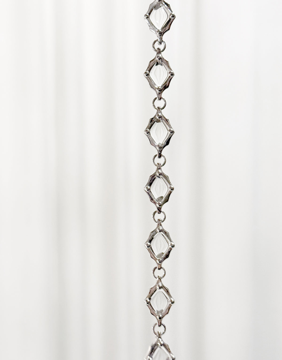 Cadence Bracelet | Metal in sterling silver, a row of open faceted links. Handmade in Los Angeles. Cadence Bracelet | Metal by CLED.