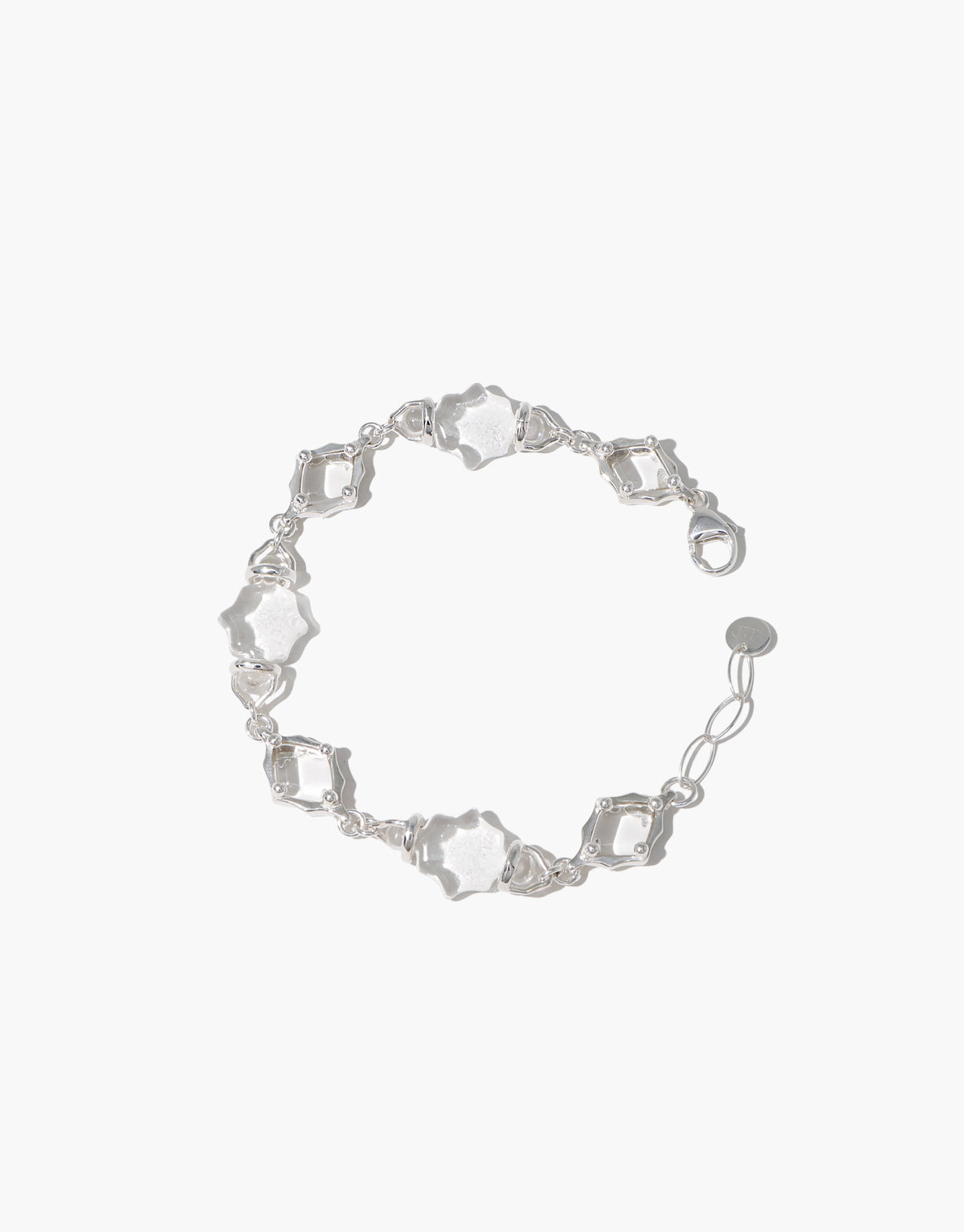 Cadence Bracelet | Glass in clear upcycled glass, alternating bare glass links with scalloped sterling silver settings. Cadence Bracelet | Glass by CLED.