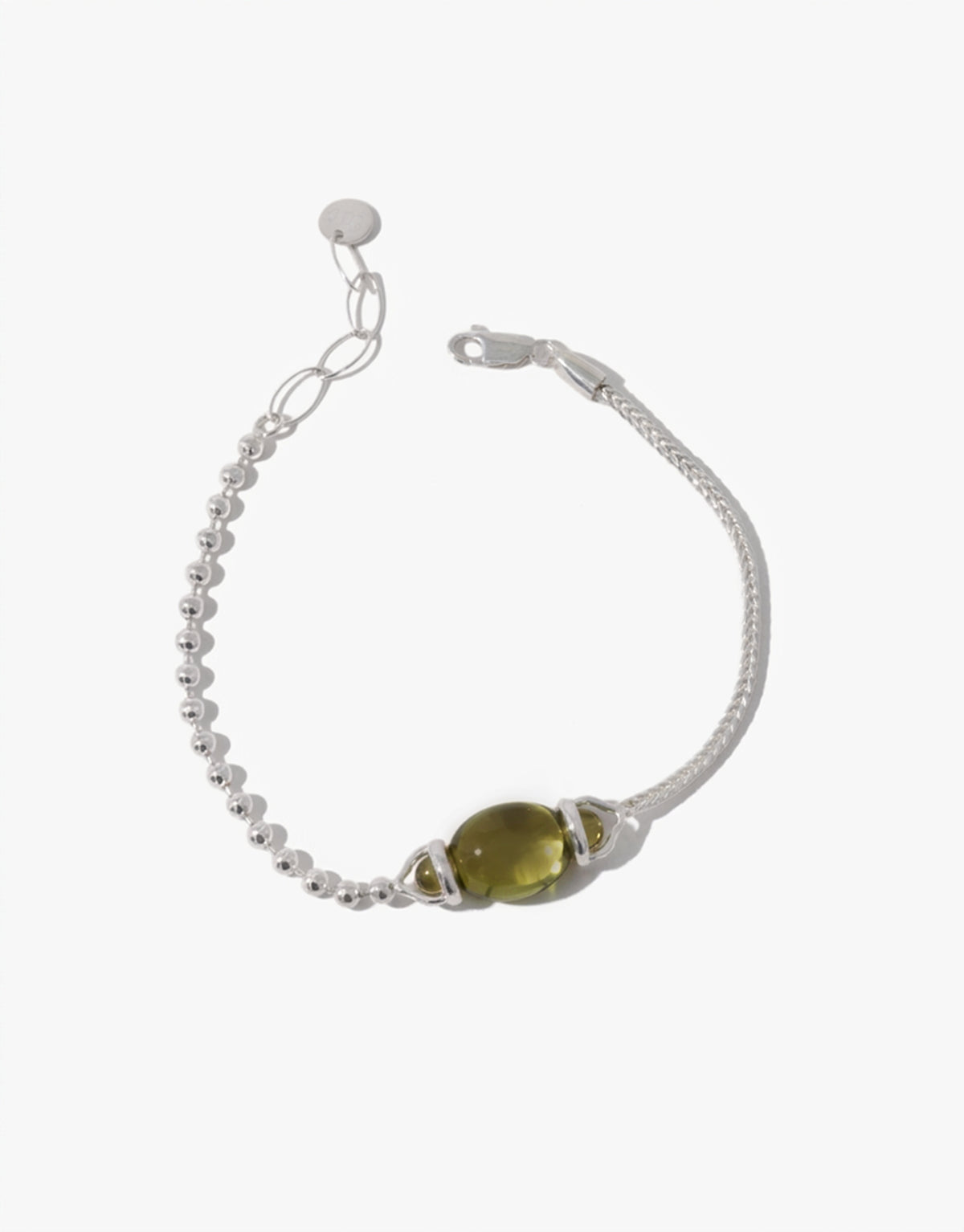 Picot Bracelet with a light olive glass Eco Gem set between small silver beads on a two-part chain. Upcycled glass jewelry from the Las Collection. Picot Bracelet by CLED.