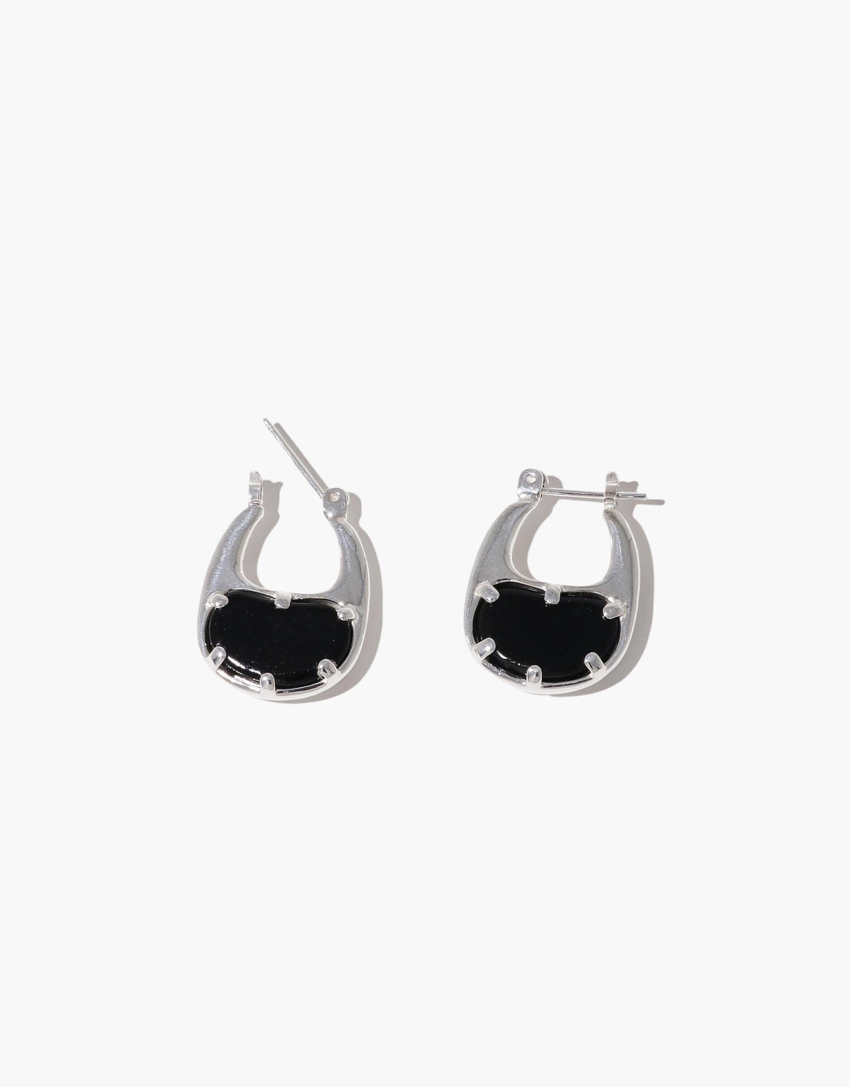 Small silver hoop earrings with black oval insets, inspired by organic bean shapes. Elegant and nature-inspired design for everyday wear. Bean Hoop Earrings | Small by CLED