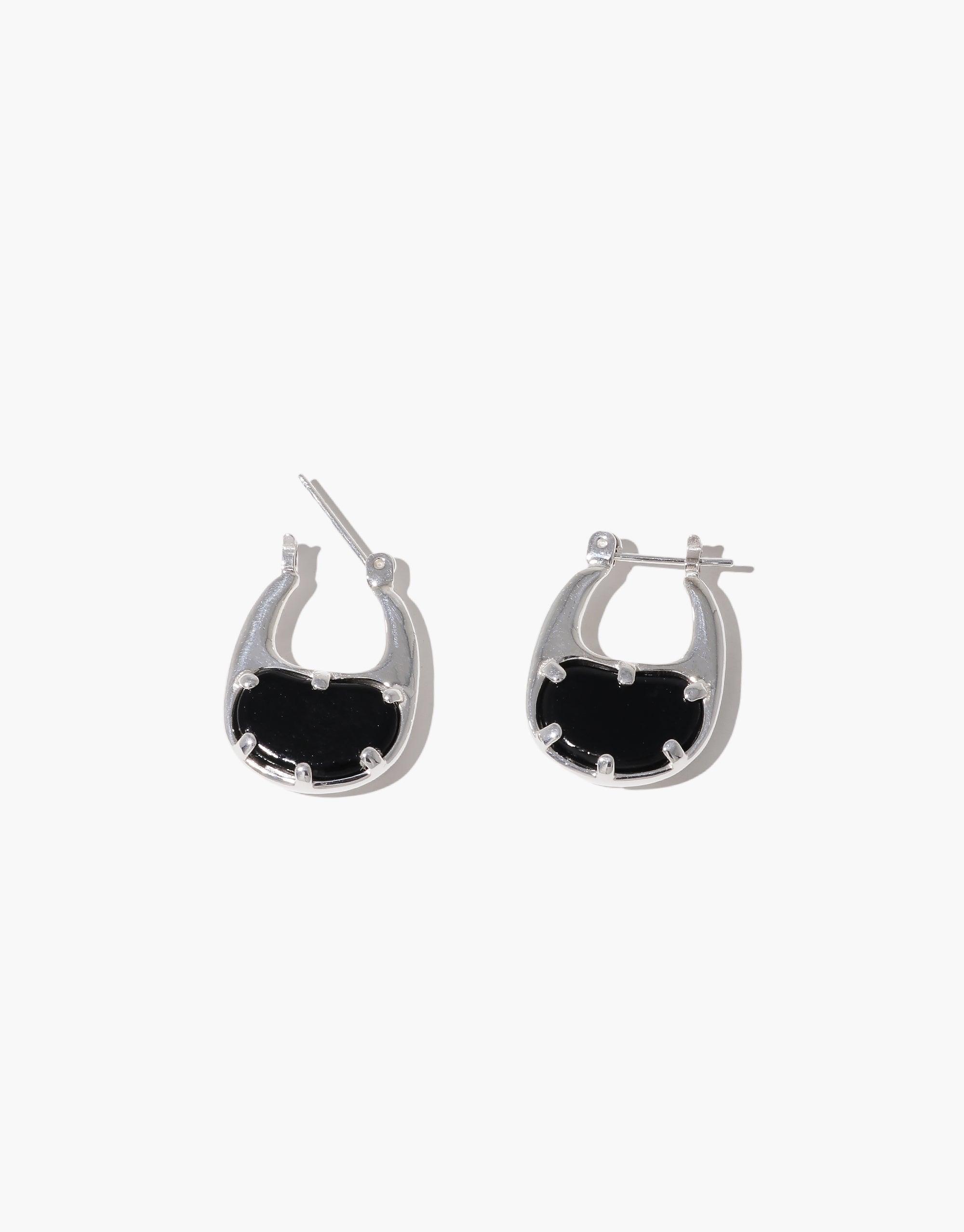 Small silver hoop earrings with black oval insets, inspired by organic bean shapes. Elegant and nature-inspired design for everyday wear. Bean Hoop Earrings | Small by CLED