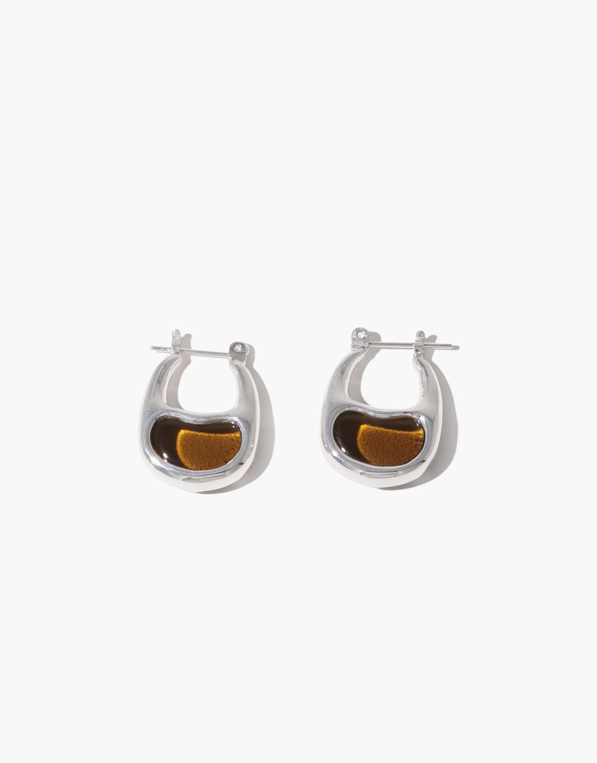 Elegant silver hoop earrings with unique bean-shaped design, featuring a warm amber-colored accent inside each hoop. Inspired by nature's organic forms. Bean Hoop Earrings | Small by CLED