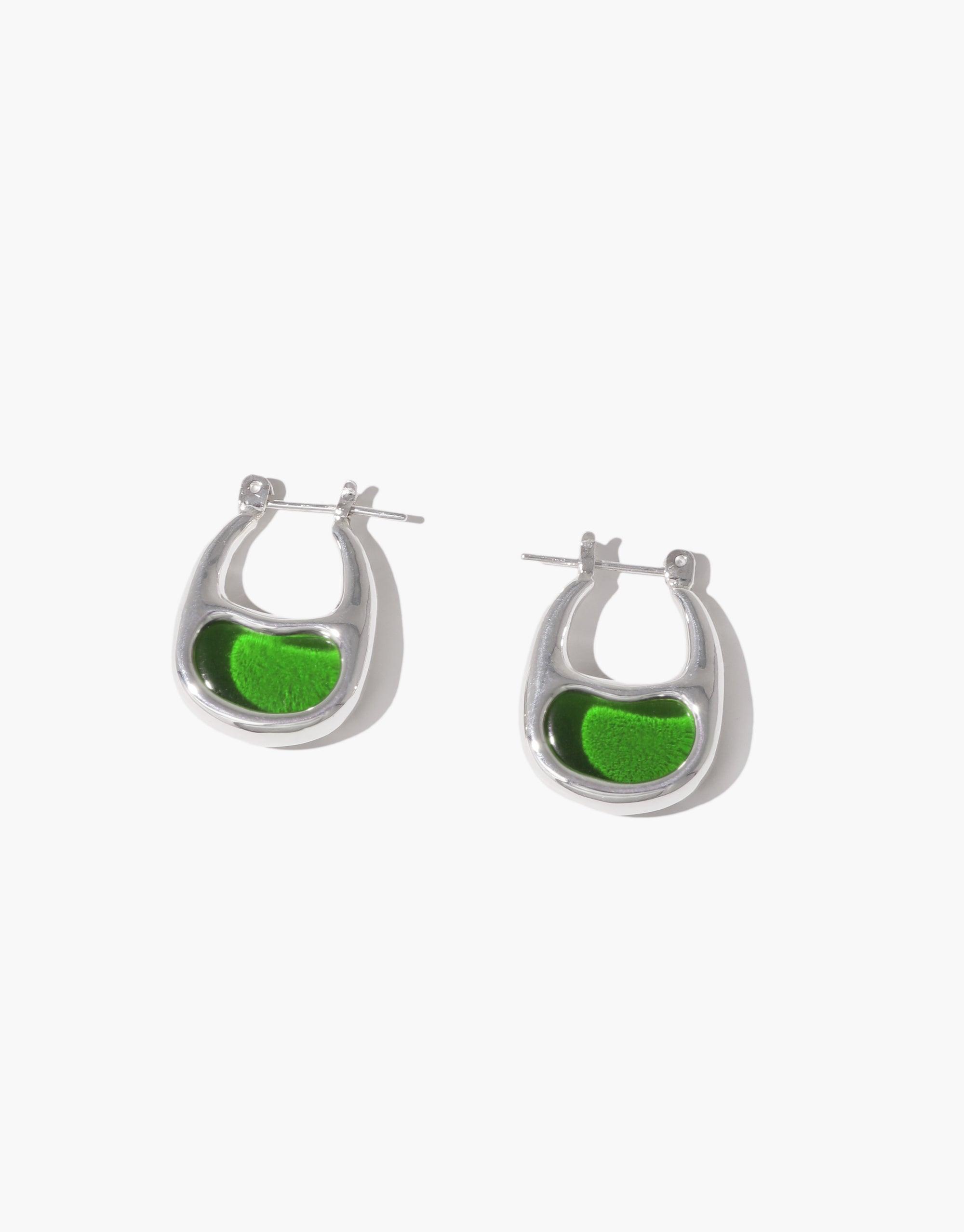 Stylish silver hoop earrings with vibrant green bean-shaped accents, inspired by nature's organic forms. Bean Hoop Earrings | Small showcase a unique blend of modern design and natural elements. Perfect for eco-conscious fashion enthusiasts. CLED