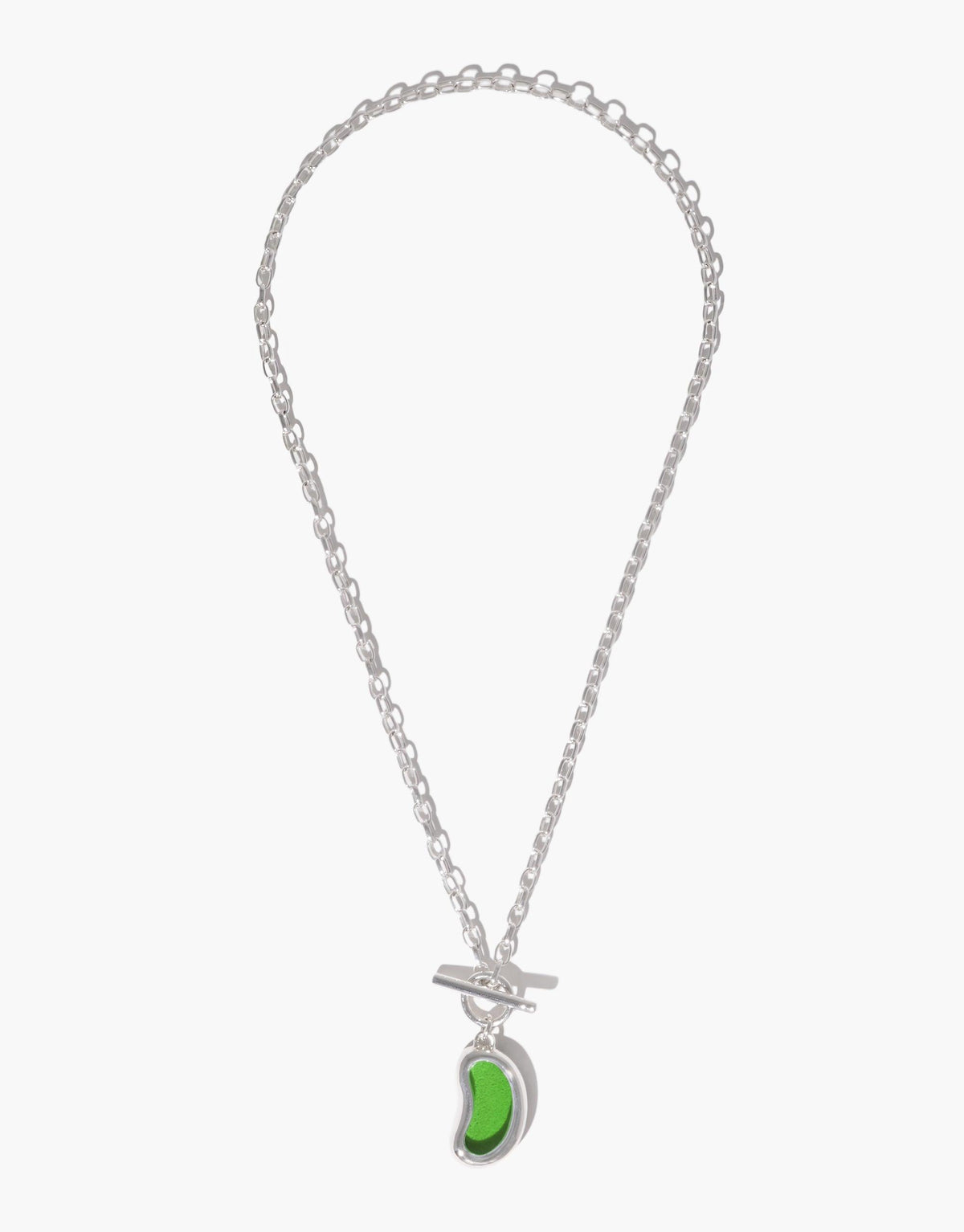 Silver chain necklace with a green bean-shaped toggle pendant, inspired by nature's organic forms. The Bean Toggle Necklace features a unique legume-inspired design, showcasing growth and transformation. Elegant and versatile accessory for nature lovers. CLED