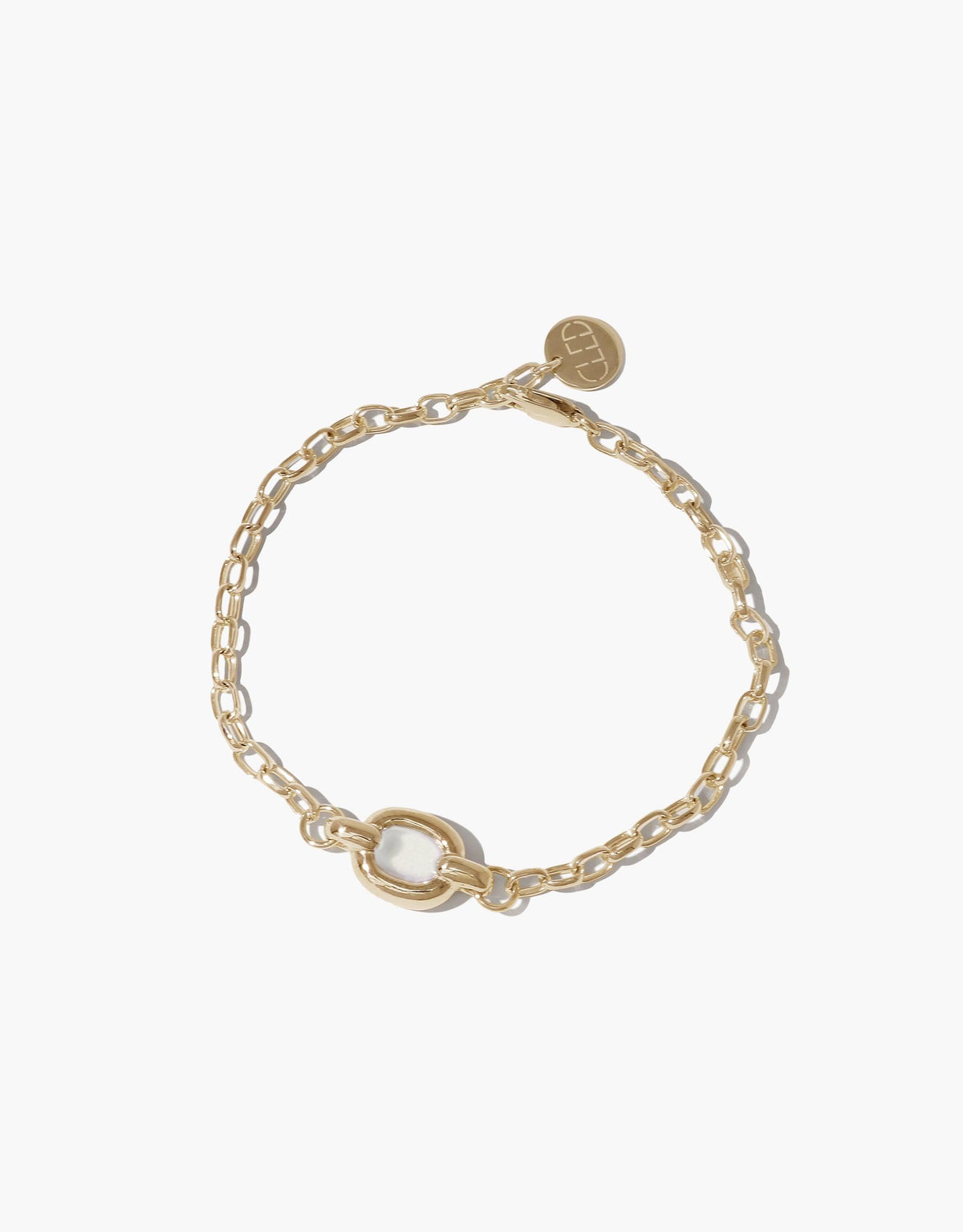 Elegant gold-toned chain bracelet with circular pendant and loop clasp, symbolizing unity and connection. Delicate yet bold design perfect for everyday wear. Core Loop Bracelet by CLED, showcasing upcycled materials and timeless style.