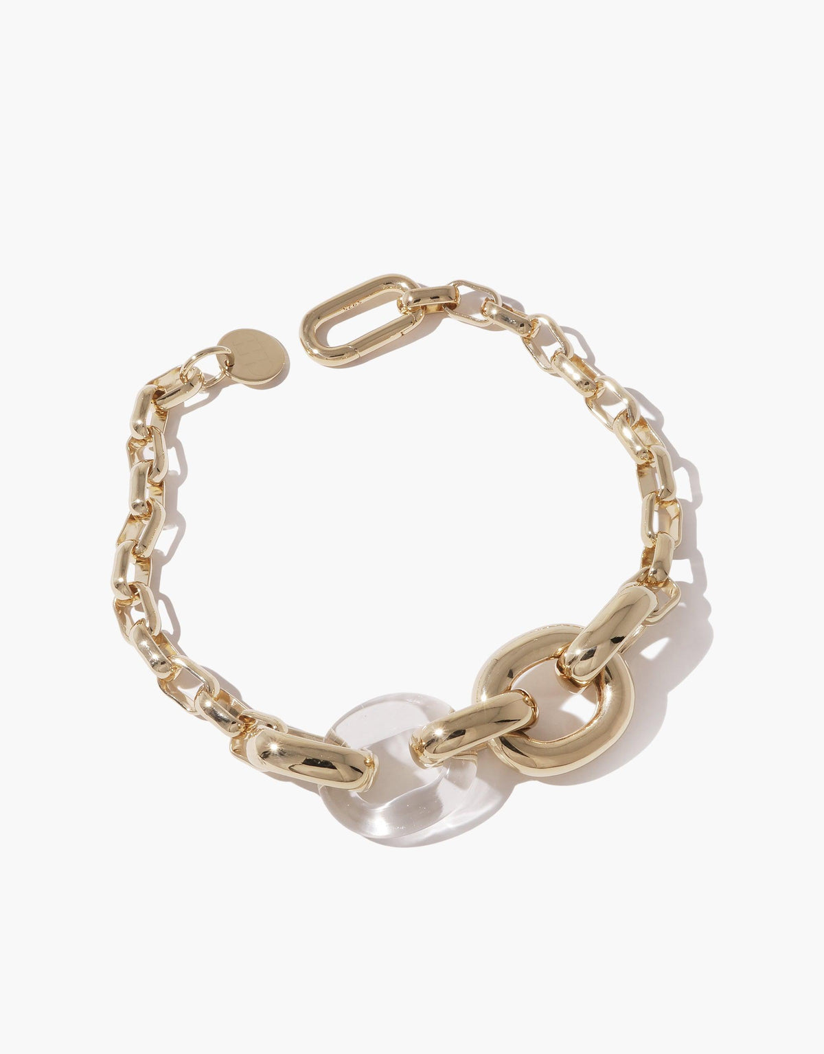 Gold-toned Loop Chain Bracelet with translucent acrylic links, showcasing a unique blend of materials. Elegant and modern design symbolizing unity and connection. Sustainable jewelry piece from the In The Loop collection by CLED. Loop Chain Bracelet.