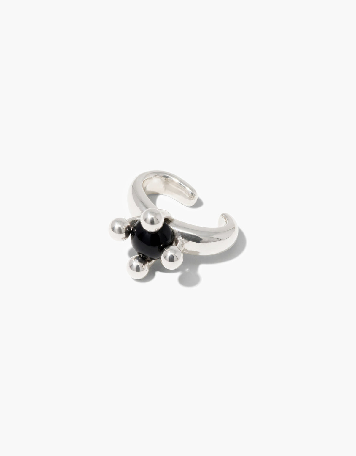 Picot Ear Cuff in sterling silver with a black basalt glass Eco Gem set between small silver beads, an open curve that holds without piercing. Picot Ear Cuff by CLED.