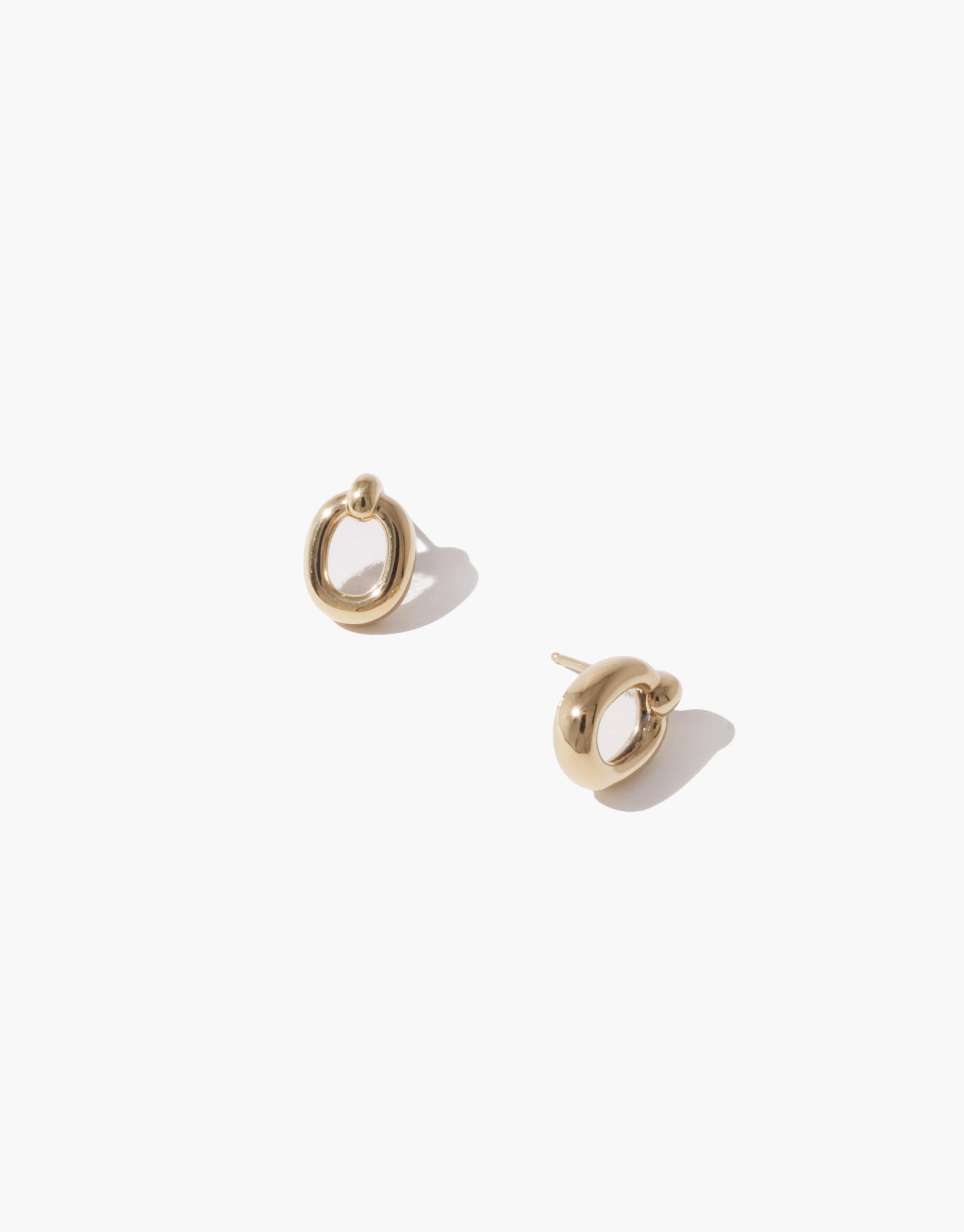 Elegant gold-toned small hoop earrings with a unique loop design, showcasing minimalist style and sustainable craftsmanship. These versatile Core Loop Earrings | Small represent unity and upcycling, perfect for everyday wear or special occasions. CLED