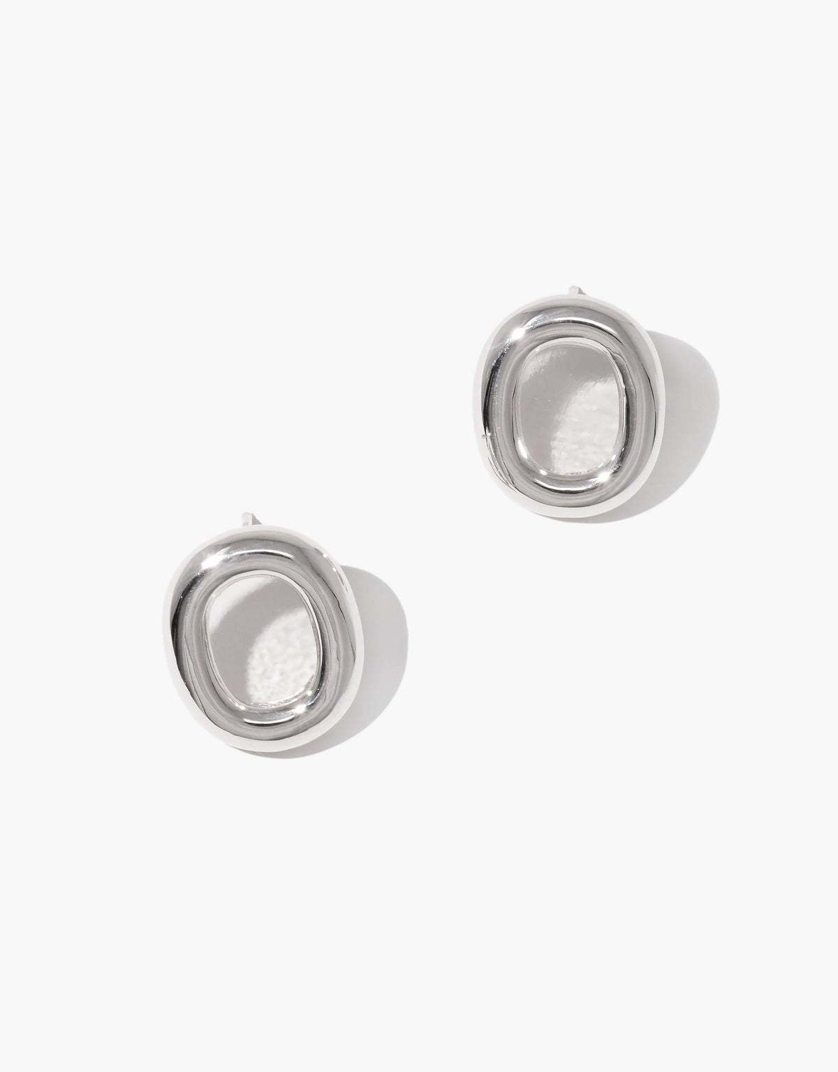 Elegant silver Core Loop Earrings | Large featuring a unique circular design. Stylish and sustainable upcycled jewelry piece symbolizing unity and connection. Perfect for everyday wear or special occasions. CLED