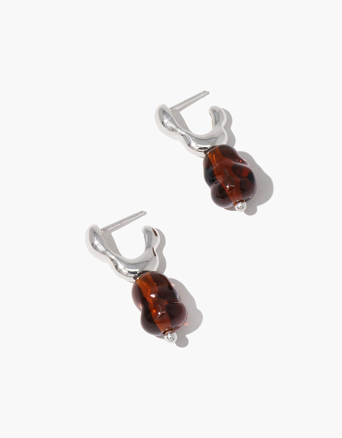 Flow Drop Hoop Earrings featuring sculptural silver hoops with amber glass drops, handcrafted sustainable jewelry by CLED