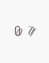 Sleek silver Loop Stud Earrings with oval-shaped design, perfect for attaching charms. Versatile and minimalist jewelry piece for customizable style. Loop Stud Earring by CLED.