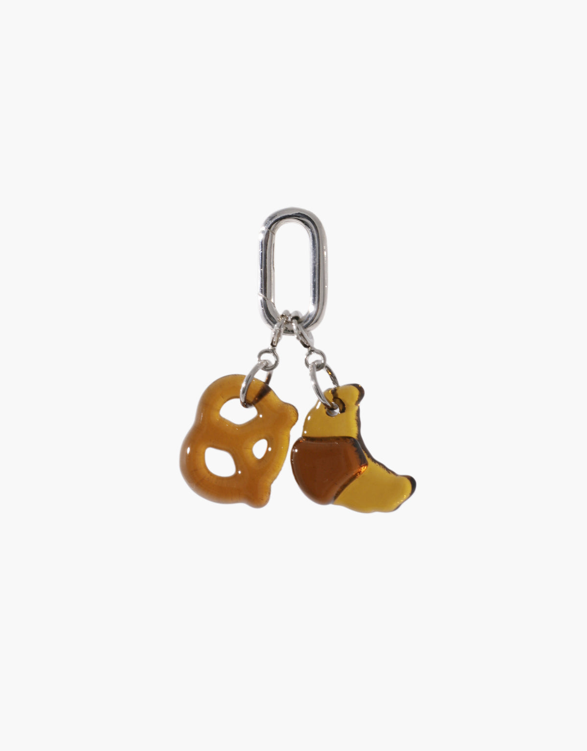 Silver Loop Stud Earring with detachable yellow pretzel and croissant charms, showcasing versatile design for mix-and-match styling. Customizable jewelry piece for personalized accessorizing. Loop Stud Earring by CLED.