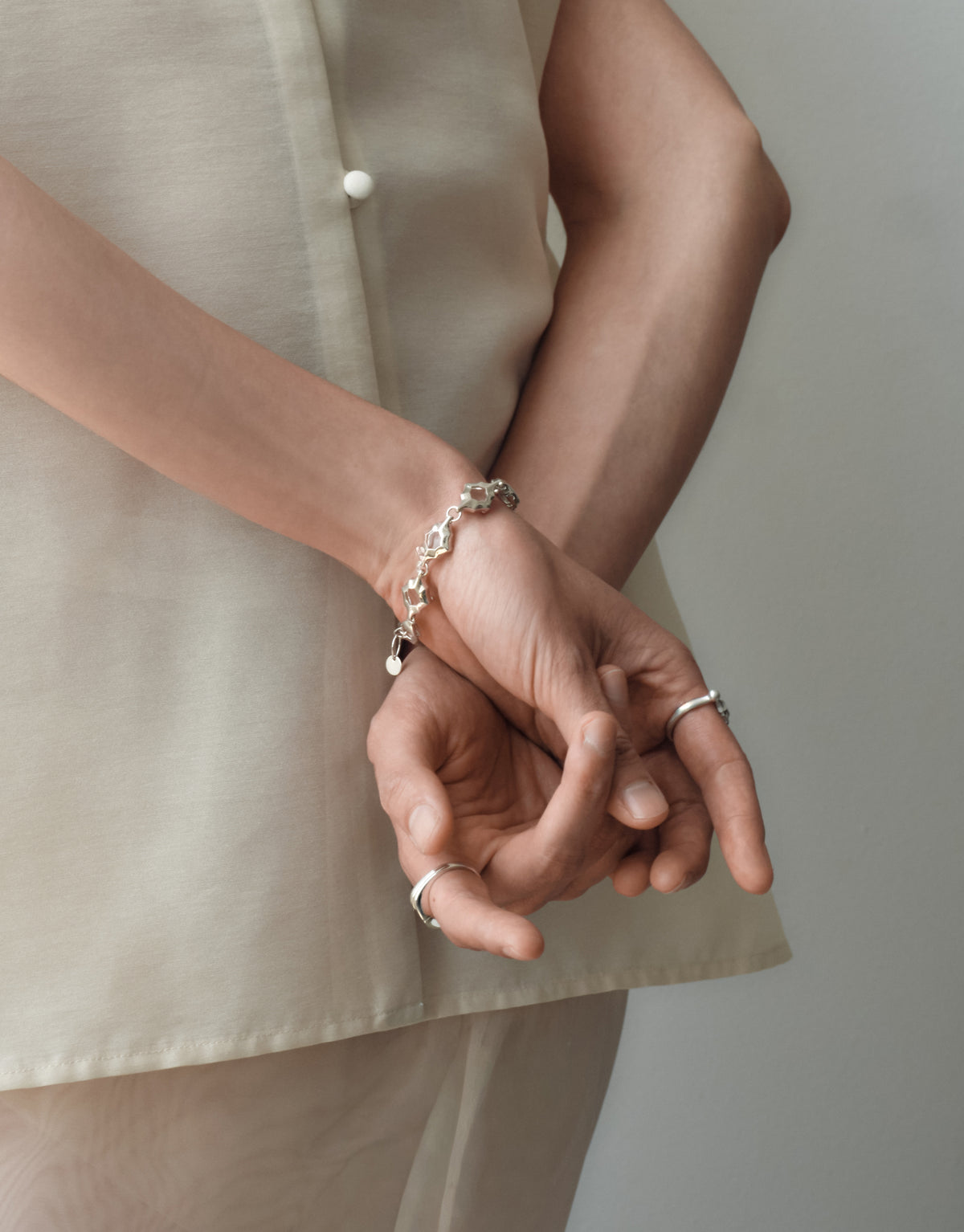 Cadence Bracelet | Metal worn on the model, upcycled glass Eco Gems framed in sterling silver. Handmade in Los Angeles. Cadence Bracelet | Metal by CLED.