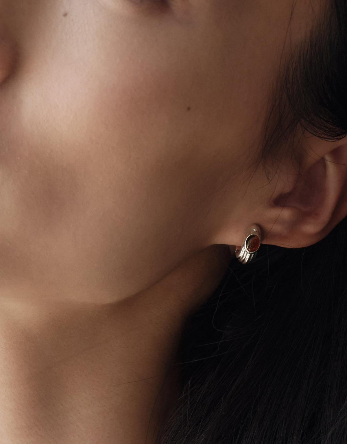 Scallop Hoop Earrings worn on the model, upcycled glass Eco Gem set in sterling silver. Handmade in Los Angeles. Scallop Hoop Earrings by CLED.