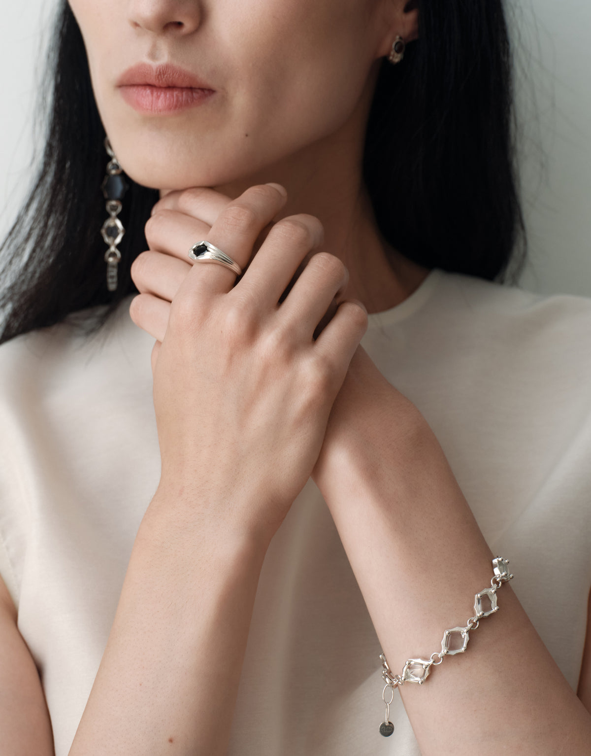 Cadence Linear Earring in clear glass worn with the Cadence Bracelet, upcycled glass Eco Gems set in sterling silver. Cadence Linear Earring by CLED.