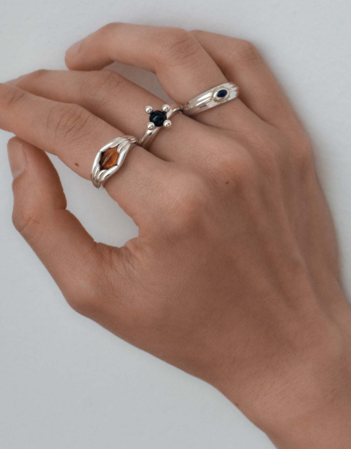 Fluted Ring worn on the model, upcycled glass Eco Gem set in sterling silver. Handmade in Los Angeles. Fluted Ring by CLED.